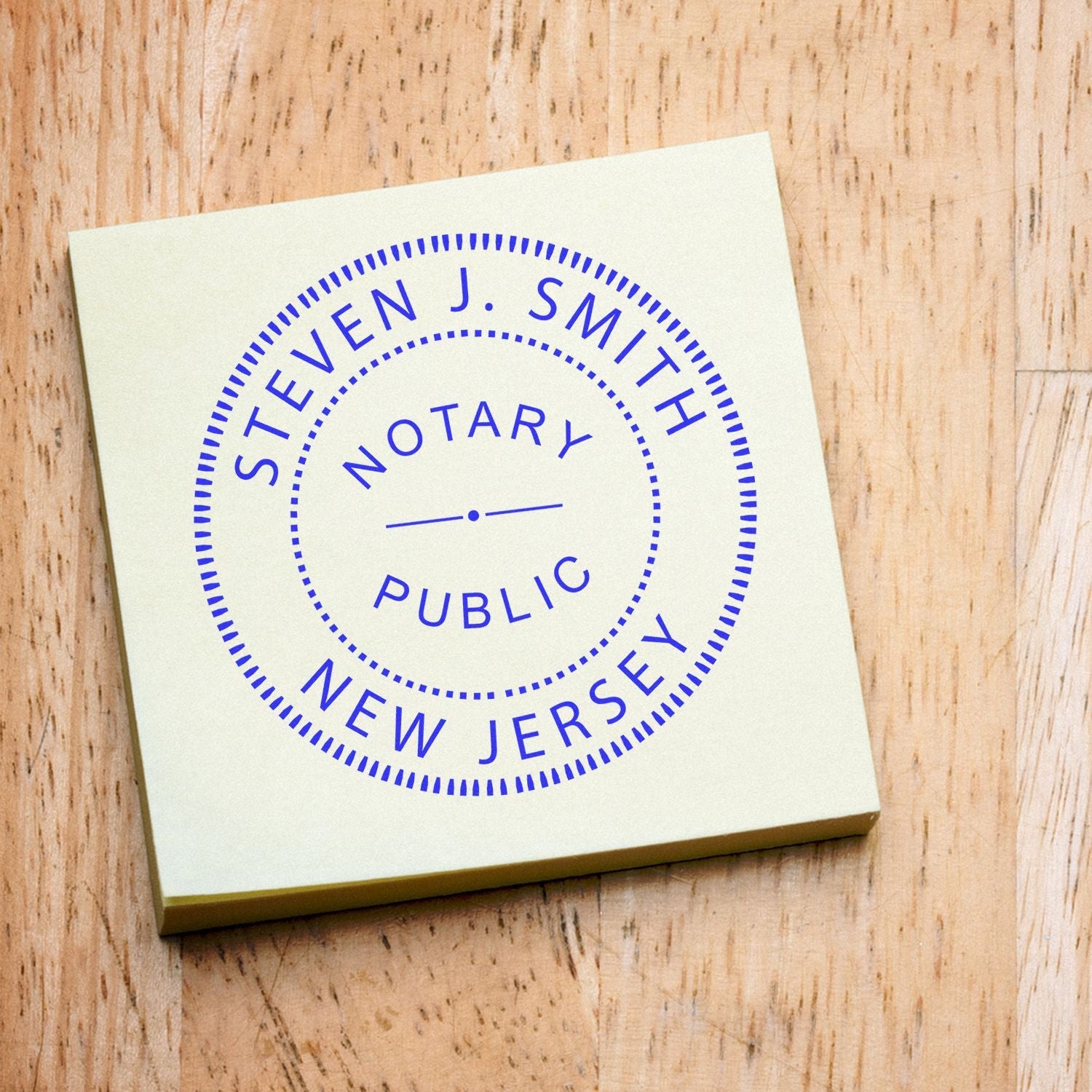 Alt Text: Custom round notary stamp on a wooden surface. Blog post: Leave a Lasting Impression with Custom Round Stamps Feature Post Image.