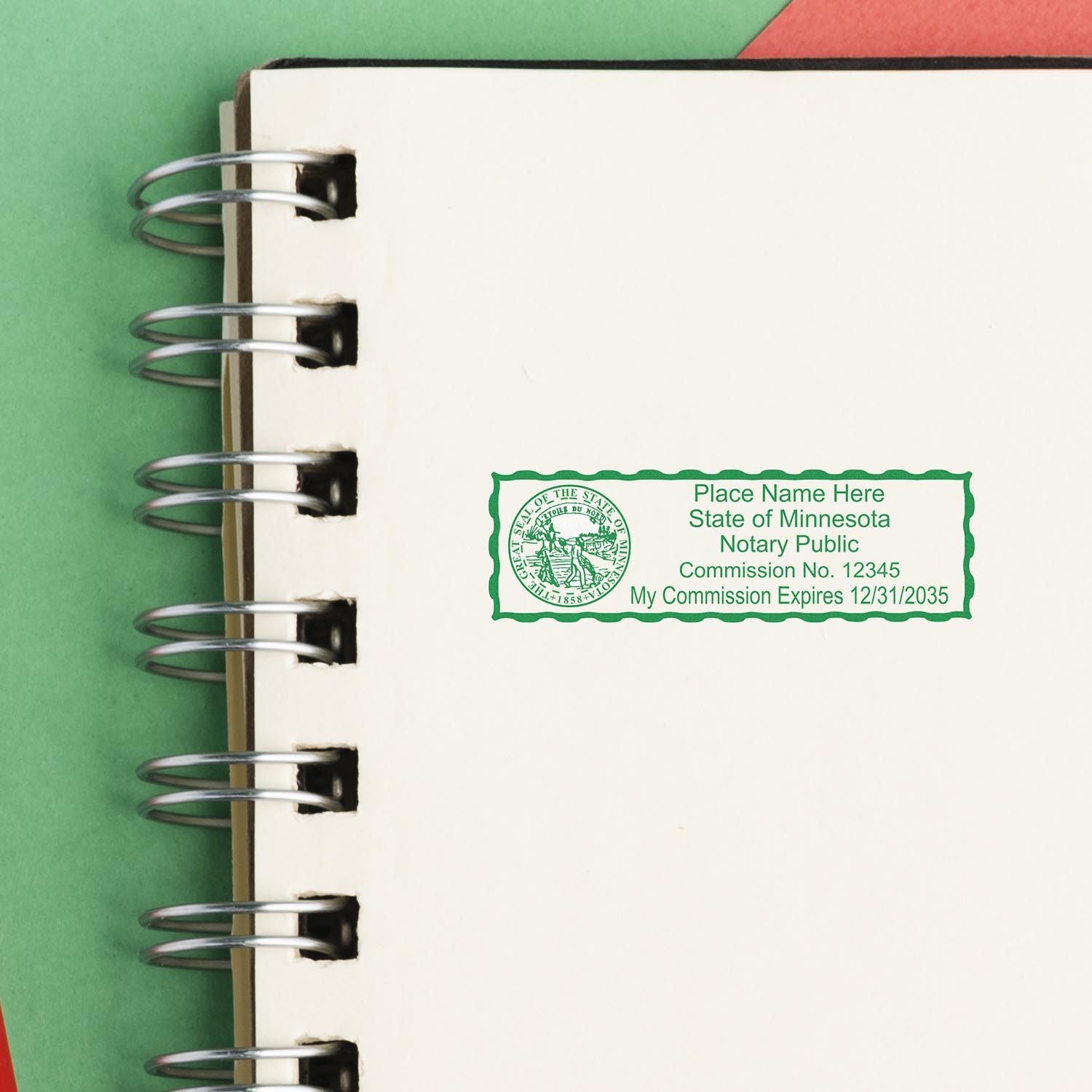 Image of a Minnesota notary public stamp on a notebook. Minnesota Notary Supplies Blog Post Feature Image.