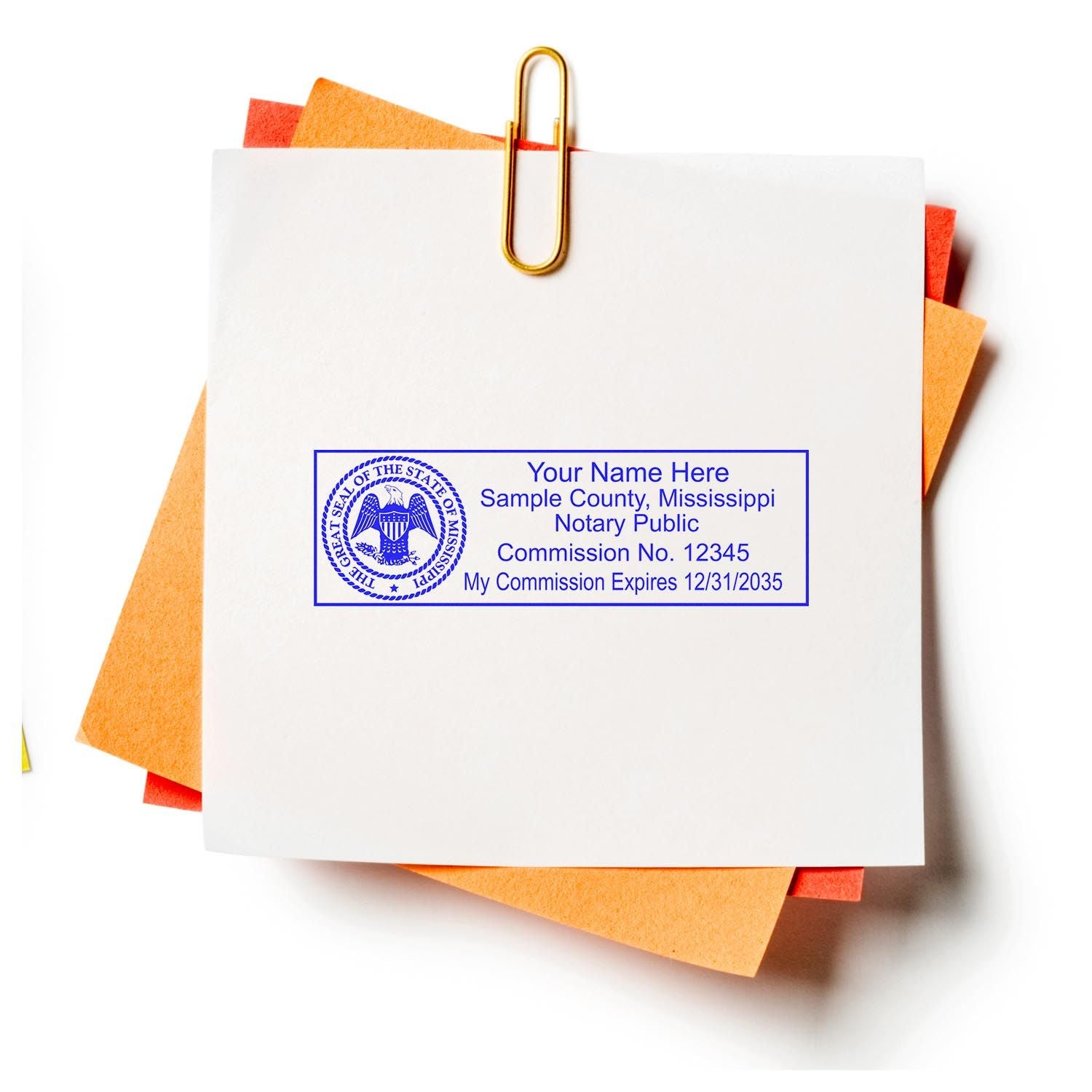 Mississippi Notary Supplies, Notary Public Seal Embossers and Notary Stamps: Rectangular notary stamp in use on white paper with orange background.