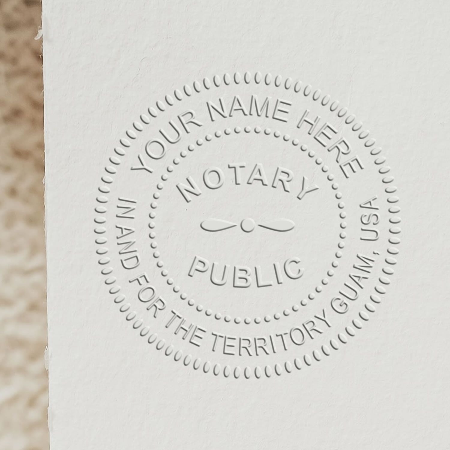 Stamp Your Authority: Unveiling the Notary Stamp Embosser Feature Image - Close-up of a notary public embossing stamp on white paper.