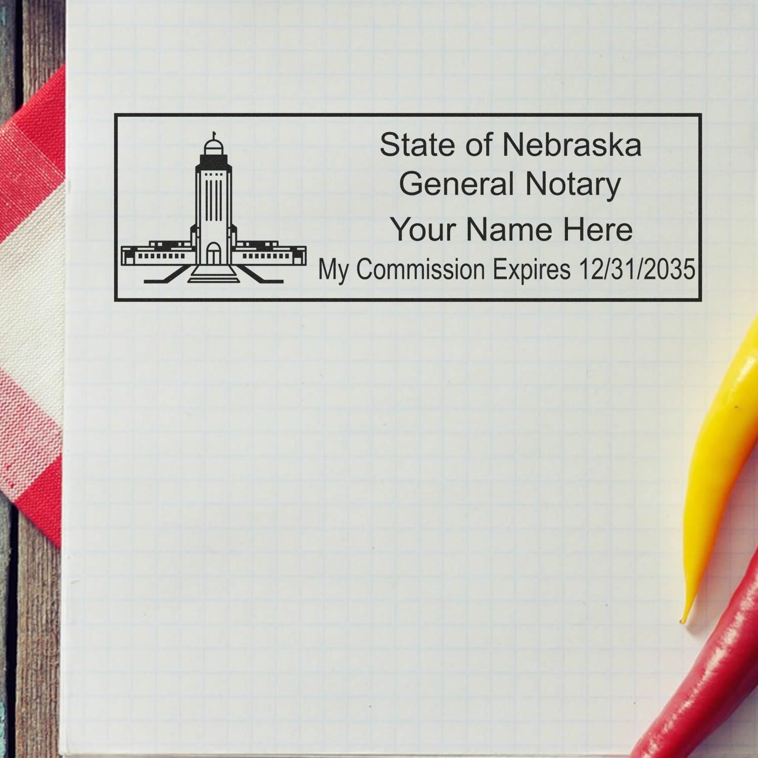 Image of a notary stamp on a checkered tablecloth with text State of Nebraska General Notary for the blog post Notary Stamp Essentials: Elevate Your Practice in Nebraska.
