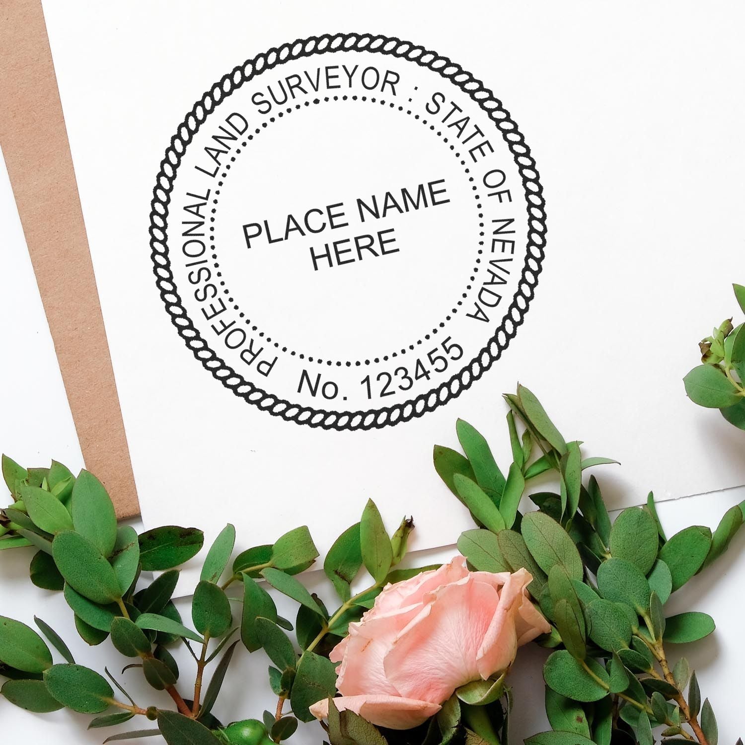 Image of a Nevada Land Surveyor Seal on paper with a rose and greenery. Blog post: Impress and Protect: The Nevada Land Surveyor Seal Advantage Feature Image.