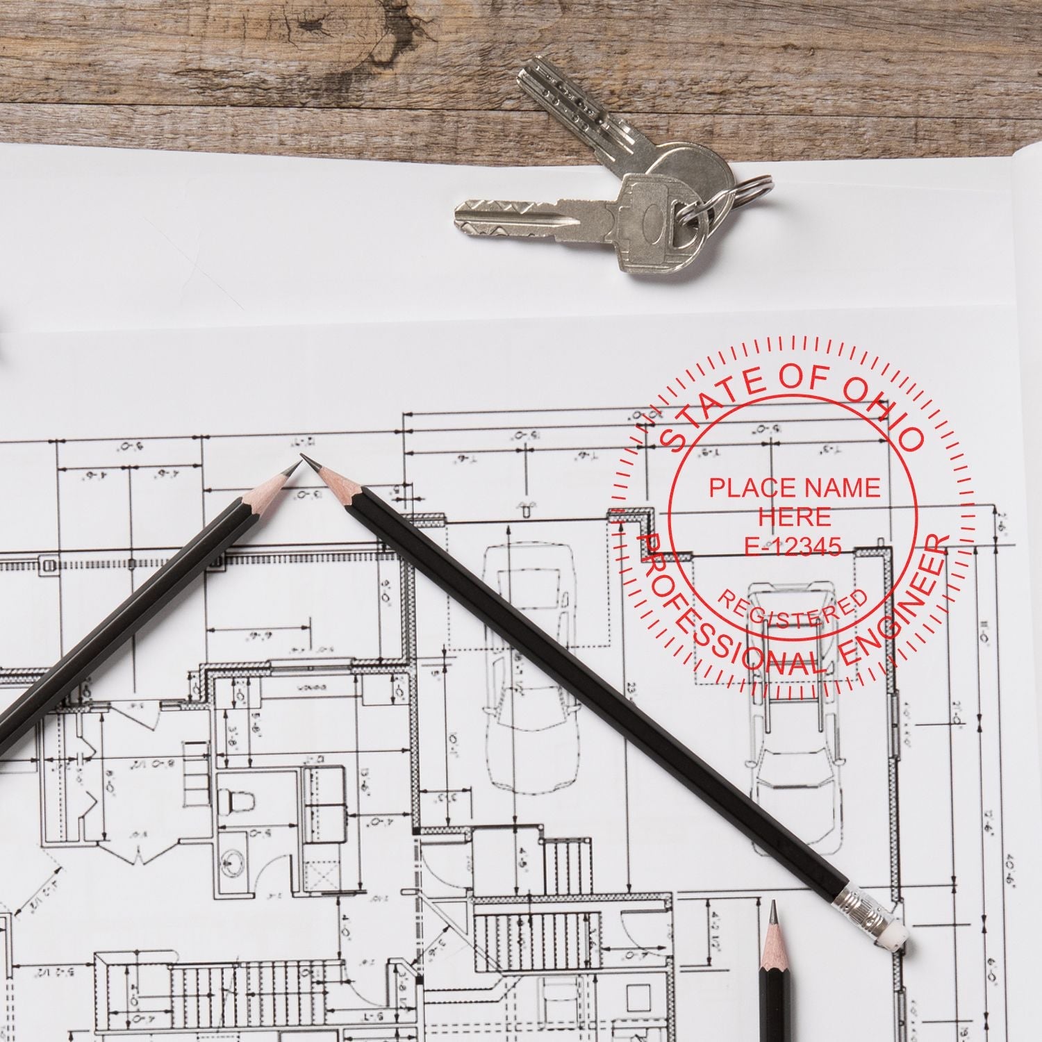 Ohio Engineer Seal blog post: Architectural blueprint with Ohio Engineer Seal stamp, three pencils, and keys on a wooden table.