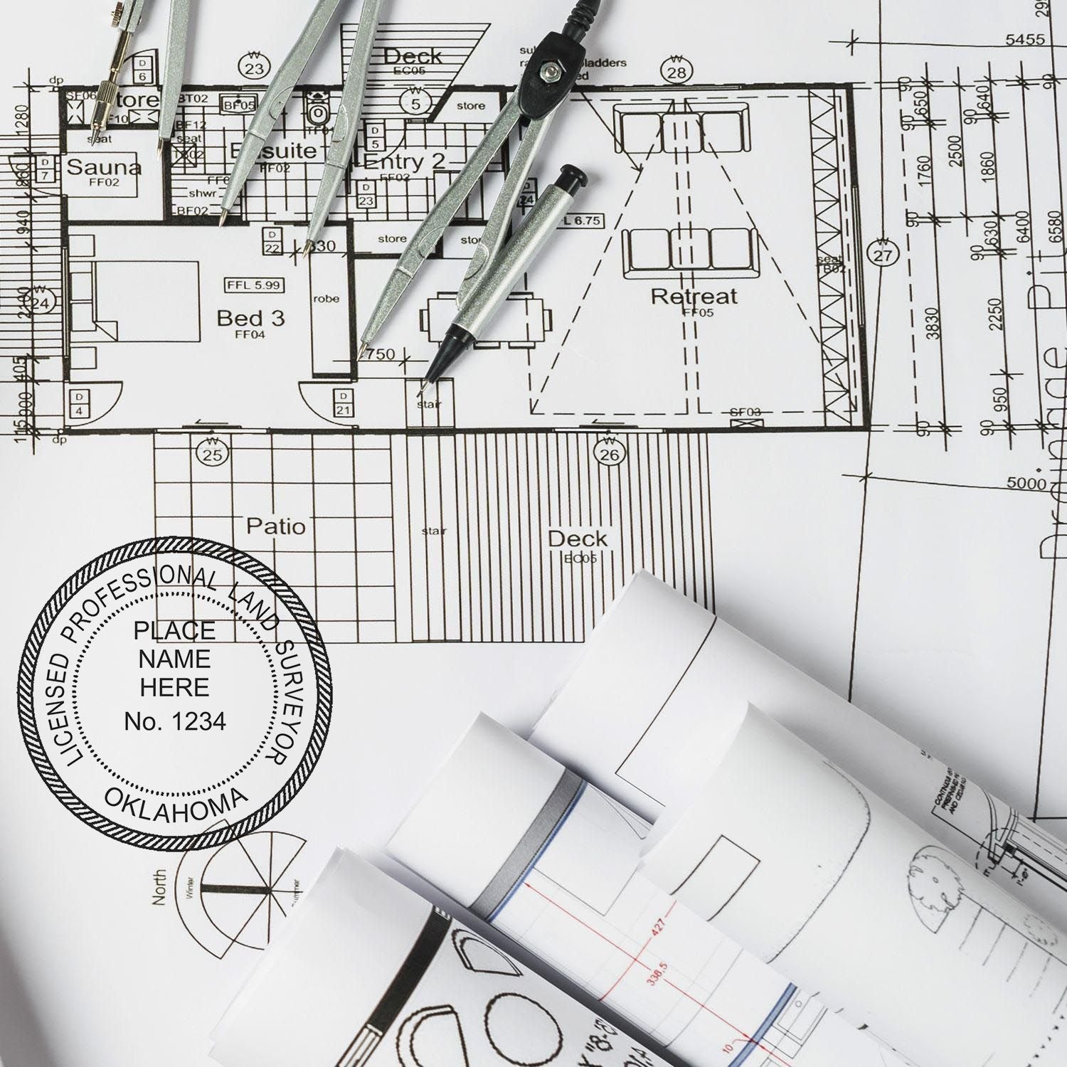 Blueprints with drafting tools and Oklahoma Land Surveyor Seal. Blog post: Oklahoma Land Surveyor Seal.