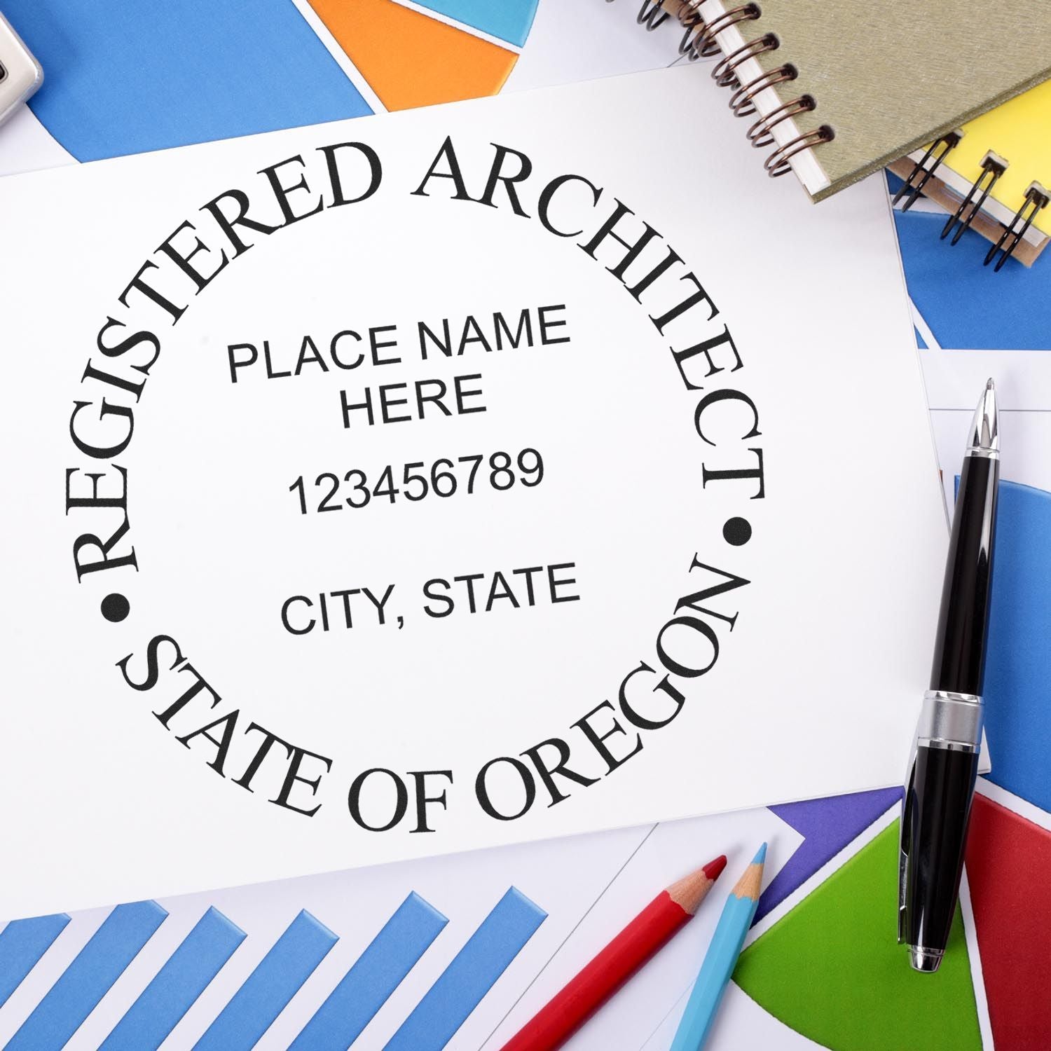 Feature image for blog post 'Renew with Ease: Oregon Architect Stamp Renewal Made Simple' showing an Oregon architect stamp on a desk.