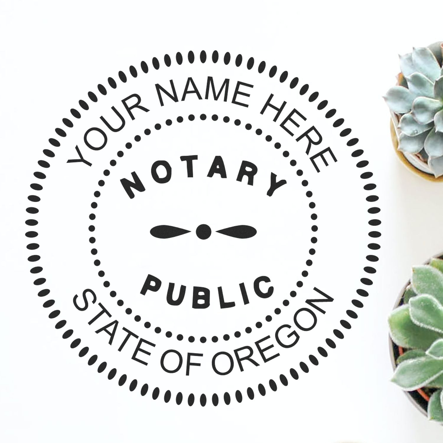 Unlocking Notarial Authority: Notary Stamps for Sale Now! Feature Image. Oregon Notary Public stamp with succulents in the background.