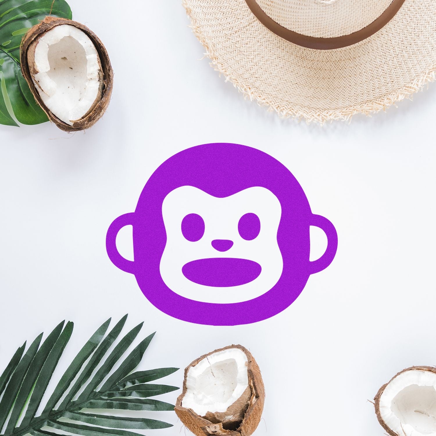 Self-Inking Monkey Marvel Reaction Stamp with a purple monkey face design, surrounded by tropical elements like coconuts and palm leaves, on a white background.