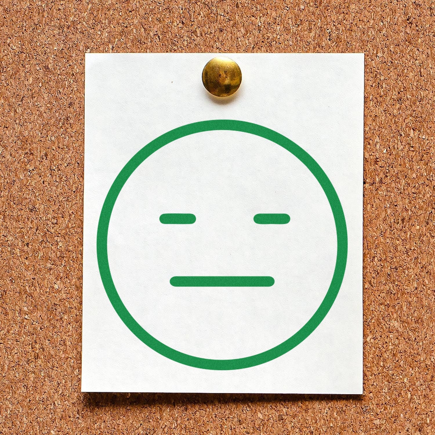 Self-Inking Meh Marvin Emoji Stamp featuring a green, expressionless face on a white paper pinned to a corkboard. Perfect for adding a touch of humor to documents and notes.