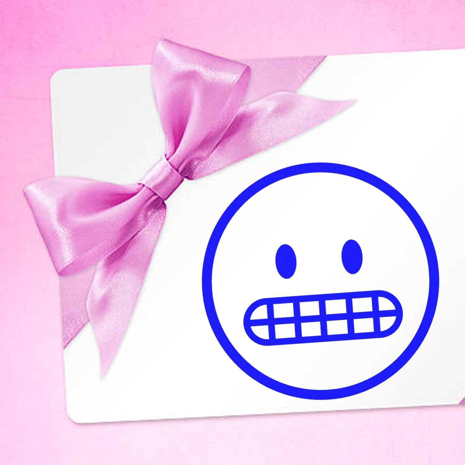 Self-Inking Awkward Alan Emoji Stamp on a pink background, featuring a blue awkward smiley face design, perfect for adding a fun touch to cards and crafts.