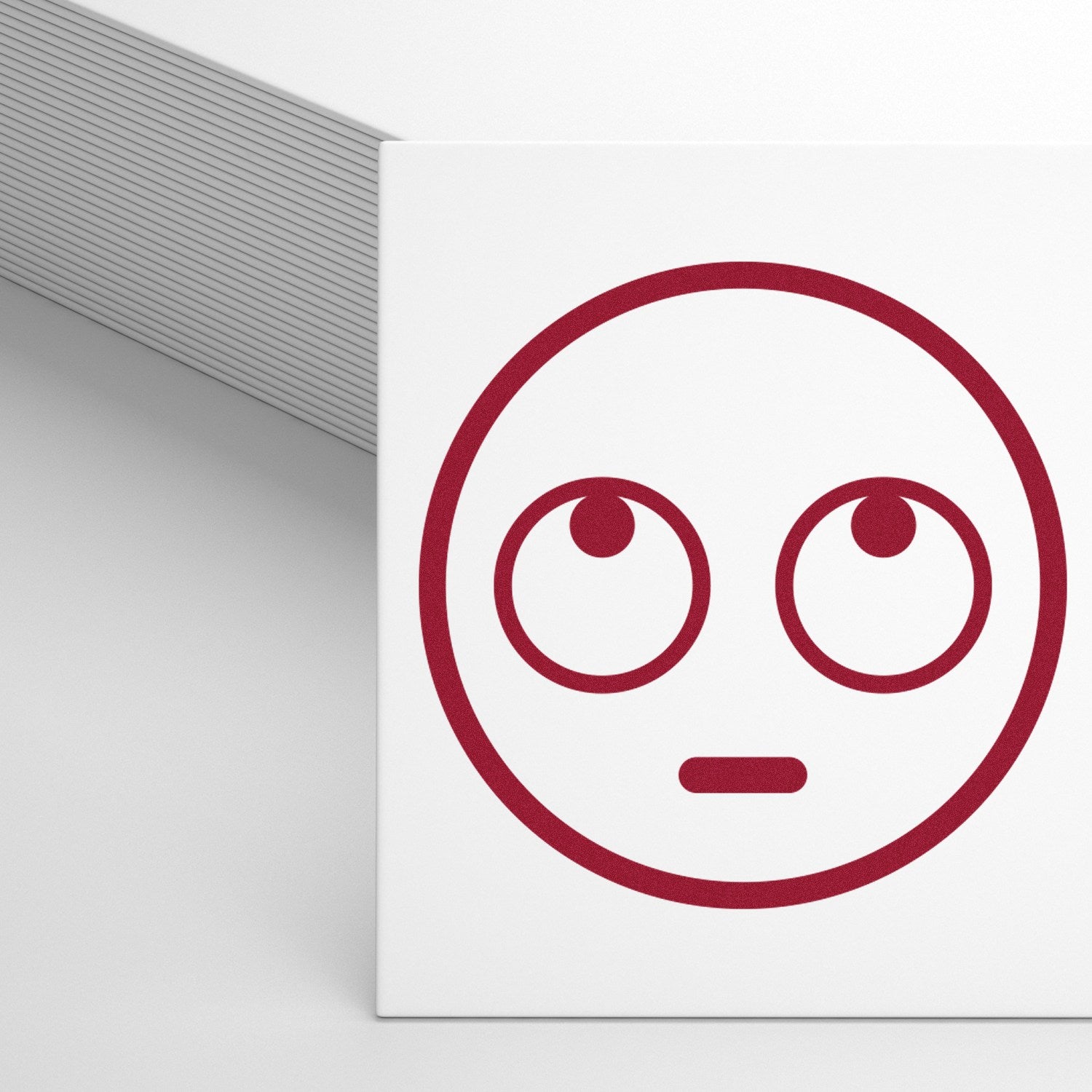 Self-Inking Blank Benny Emoticon Stamp featuring a red, wide-eyed emoticon on a white card, perfect for adding a playful touch to your stationery.