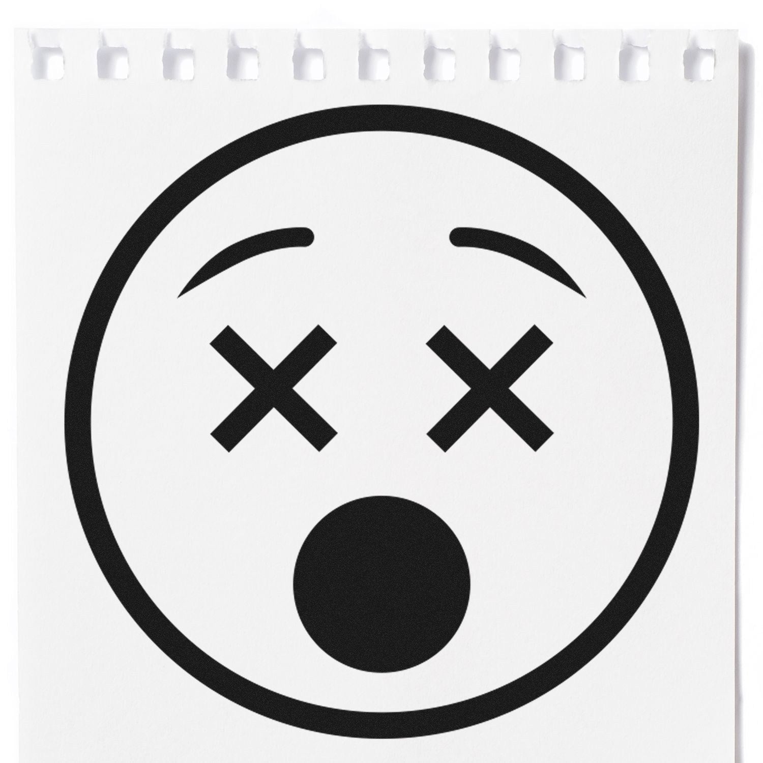 Self-Inking X'd Out Facial Expressions Stamp featuring a bold, black X-eyed face with an open mouth on a white background, perfect for adding expressive details to your projects.