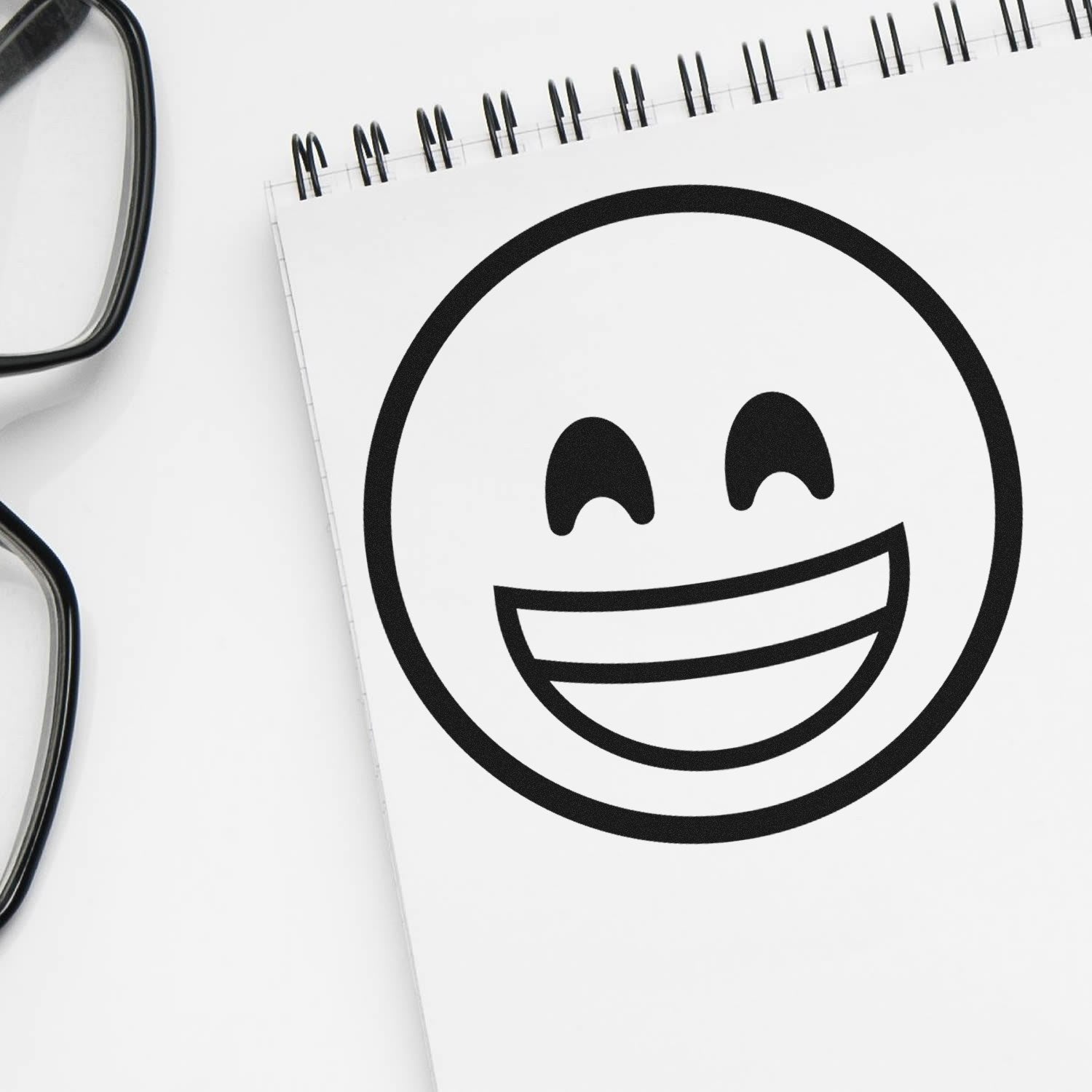 Wood Handle Elated Smile Emoji Rubber Stamp imprint on white paper, showcasing a cheerful smiley face design. Ideal for adding a fun touch to crafts and stationery.