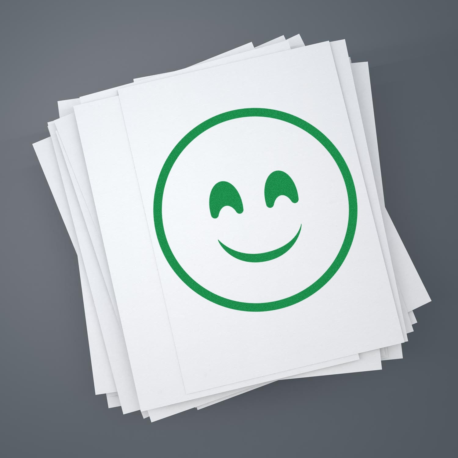 Wood Handle Blissful Wink Emoji Rubber Stamp imprint on white paper, showcasing a green smiling face with winking eyes. Perfect for adding a playful touch to crafts and stationery.