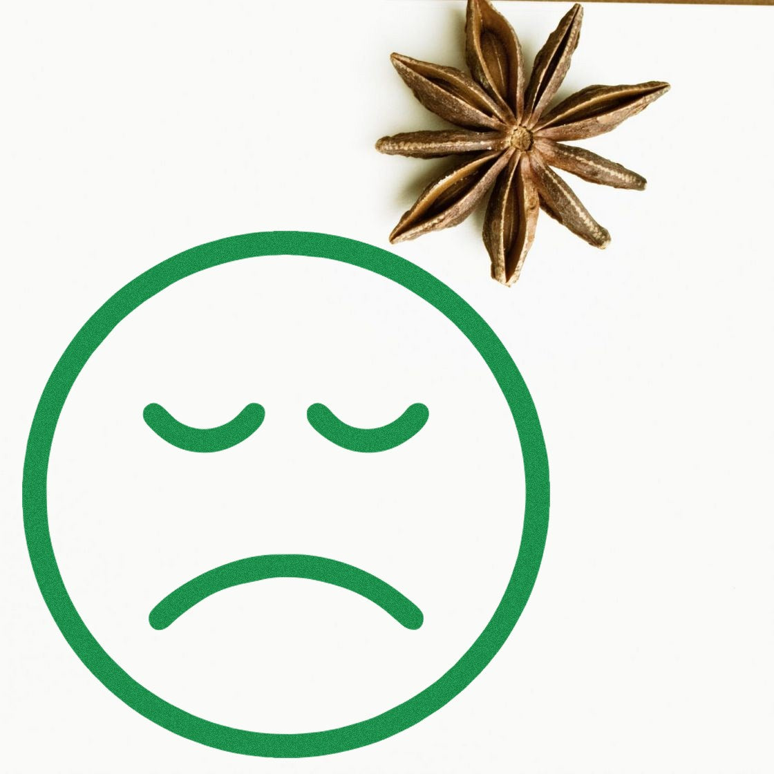 Self-Inking Downer Frown Emoticon Stamp with a green frown face design, perfect for adding a touch of humor to documents.