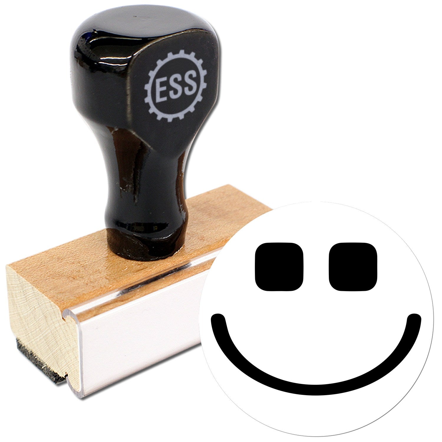 Wood Handle Geeky Grin Emotes Rubber Stamp featuring a black handle with ESS logo, mounted on a wooden base, and a smiling face design. Perfect for adding fun emotes to your projects.