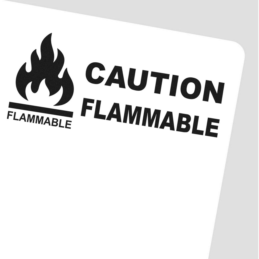 Self-Inking Caution Flammable Stamp with bold black text and flame icon on a white background, ideal for safety labeling and warnings.