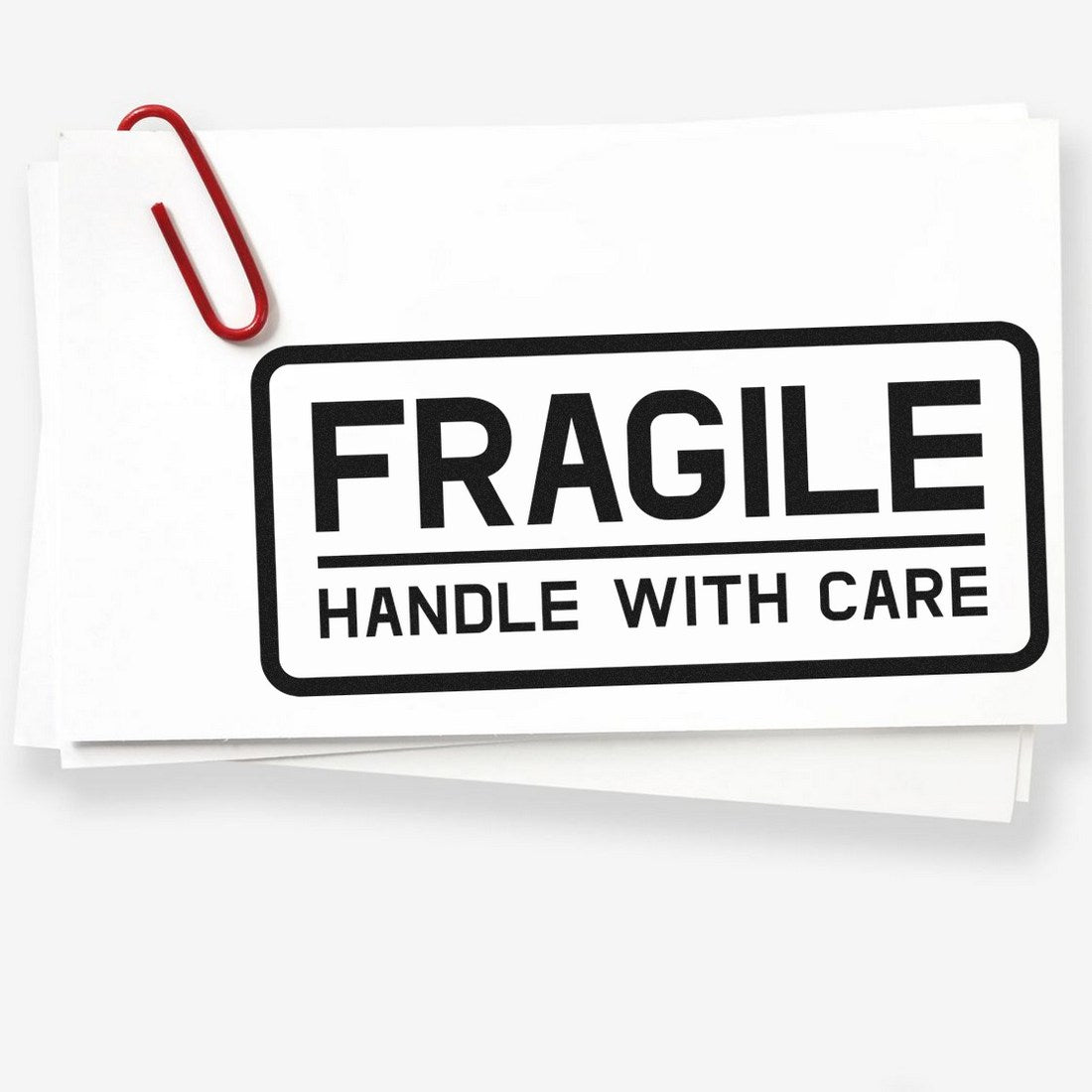 Image of a PSI Pre-Inked Fragile Handle With Care Shipping Stamp, featuring bold black text on a white background, ideal for marking packages.