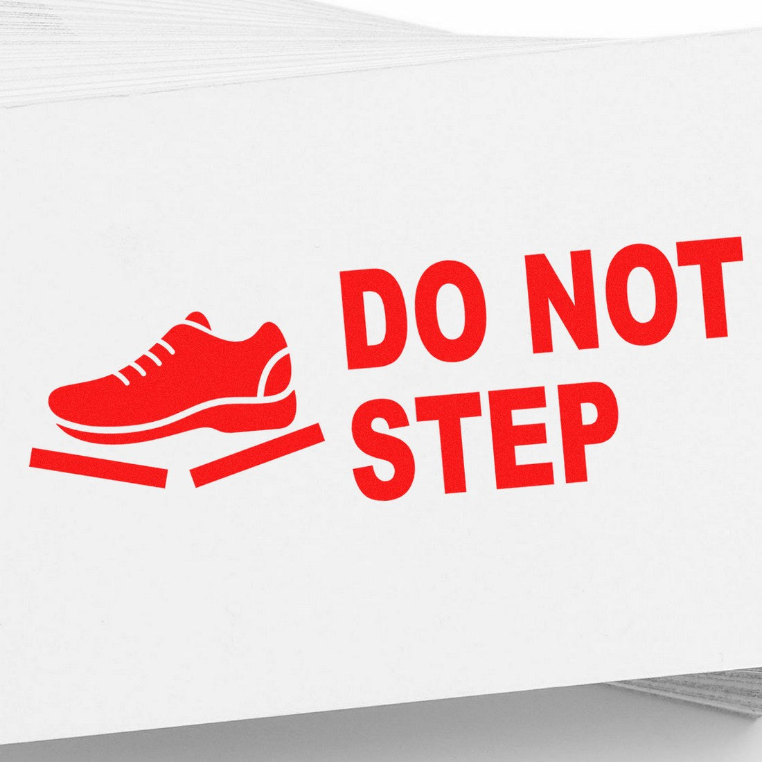 PSI Pre-Inked Handle With Care Do Not Step Stamp in red, featuring a shoe icon and bold text on a white background, ideal for marking packages and fragile items.