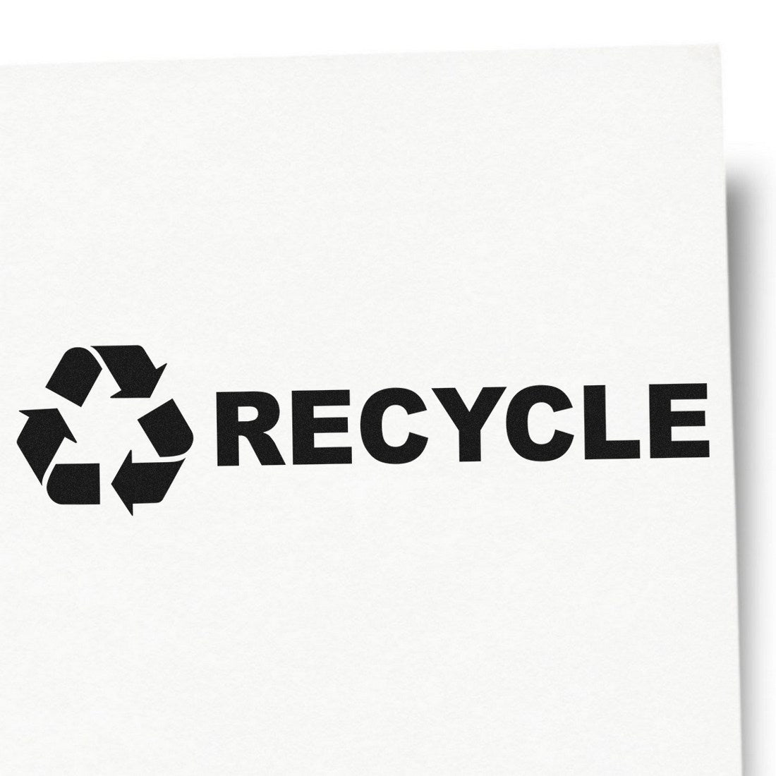 Image of Maxlight Premium Recycle Symbol Stamp imprint on white paper, featuring a bold black recycle symbol and the word RECYCLE in capital letters. Ideal for eco-friendly labeling.