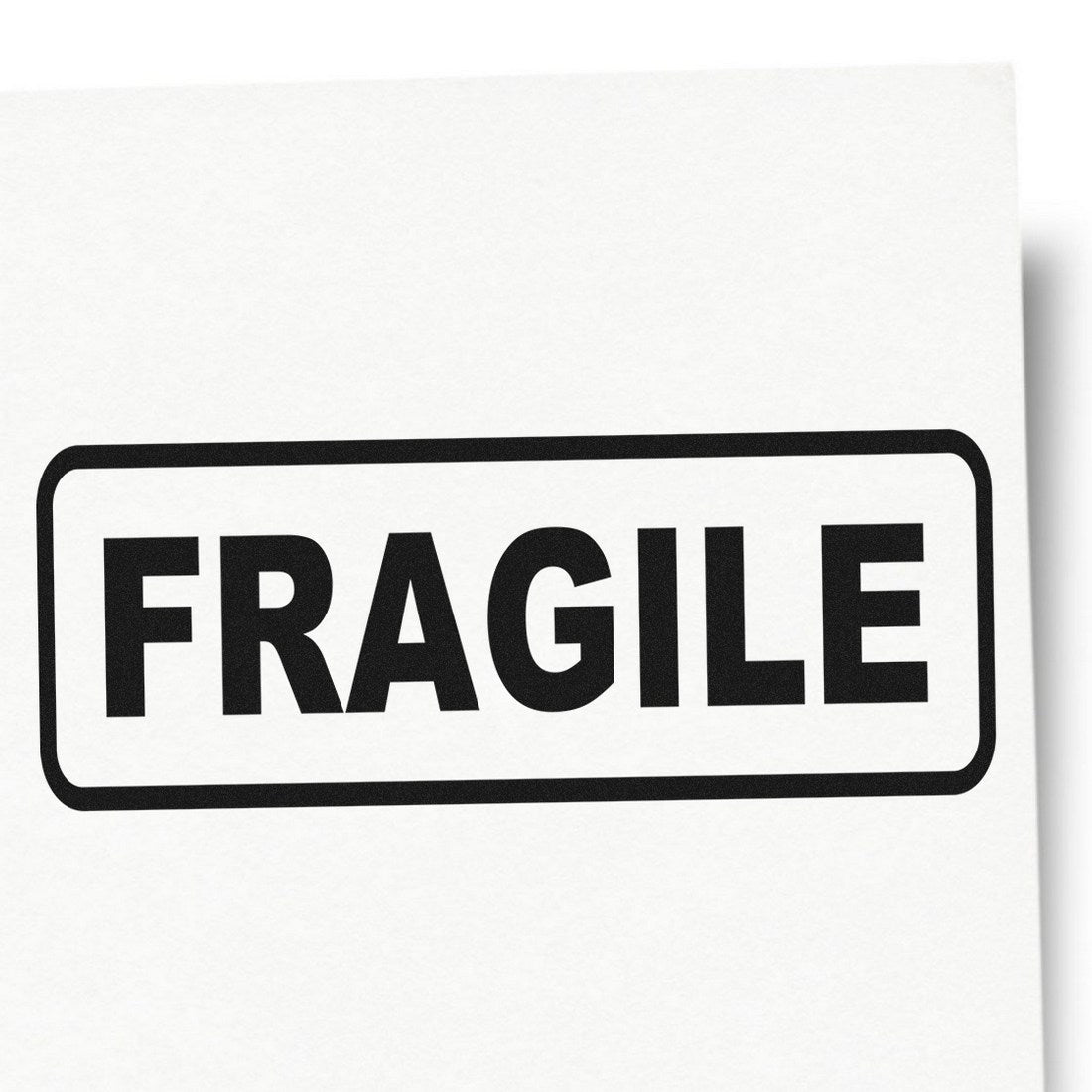 Image of a Wood Handle Fragile Rubber Stamp, featuring a sturdy wooden handle and a rubber stamp with the word FRAGILE in bold black letters, ideal for marking delicate packages.