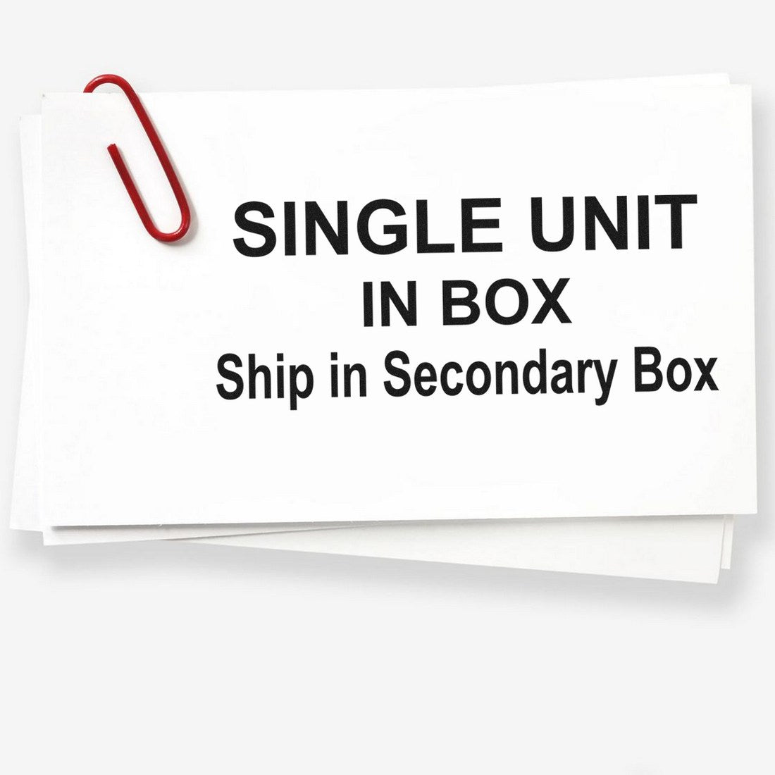 Wood Handle Single Unit Secondary Box Rubber Stamp with bold black text on white paper, secured by a red paperclip. Ideal for packaging and shipping needs.