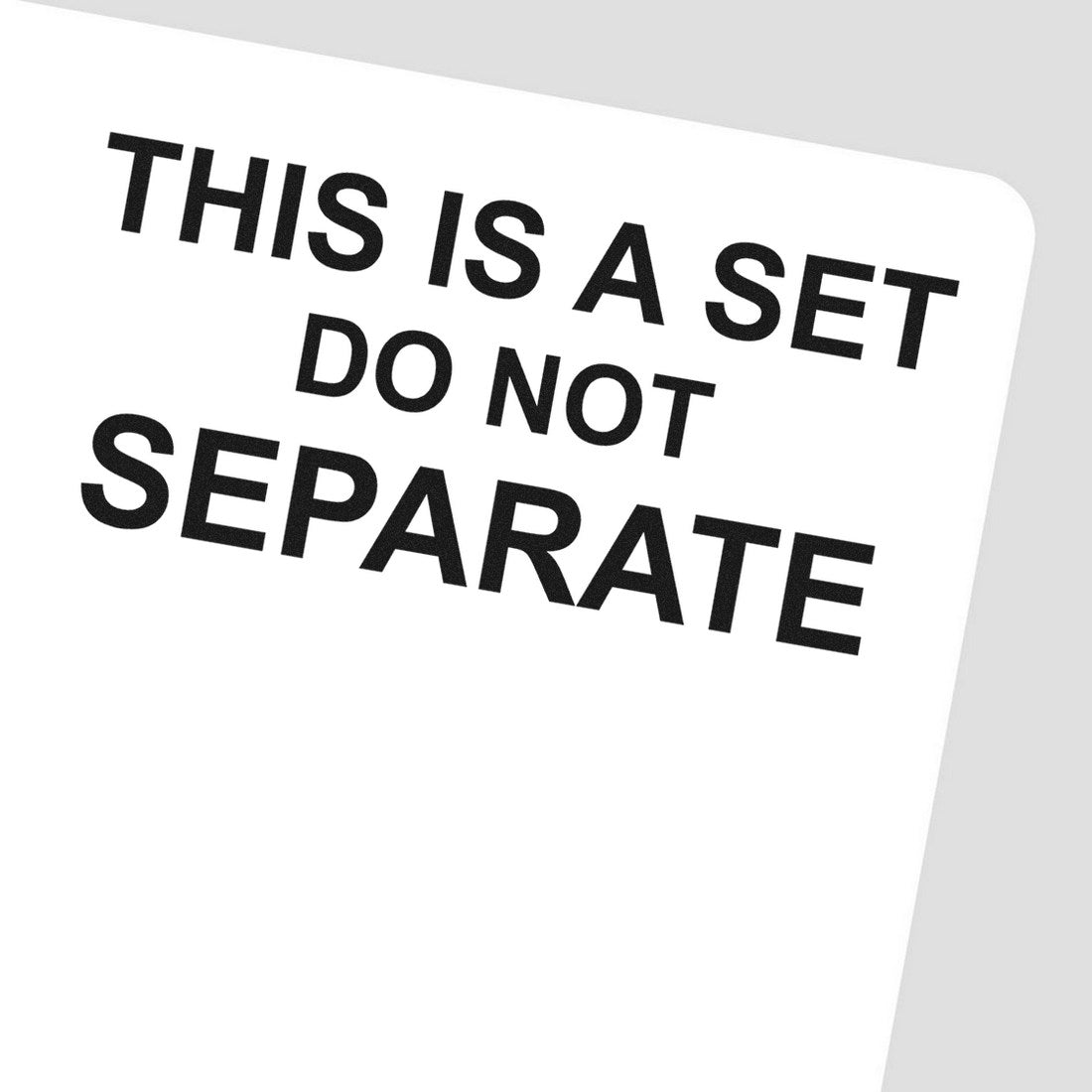 PSI Pre-Inked Do Not Separate Set Stamp with bold black text on a white background, ideal for marking items as a set. Compact and efficient design for office use.