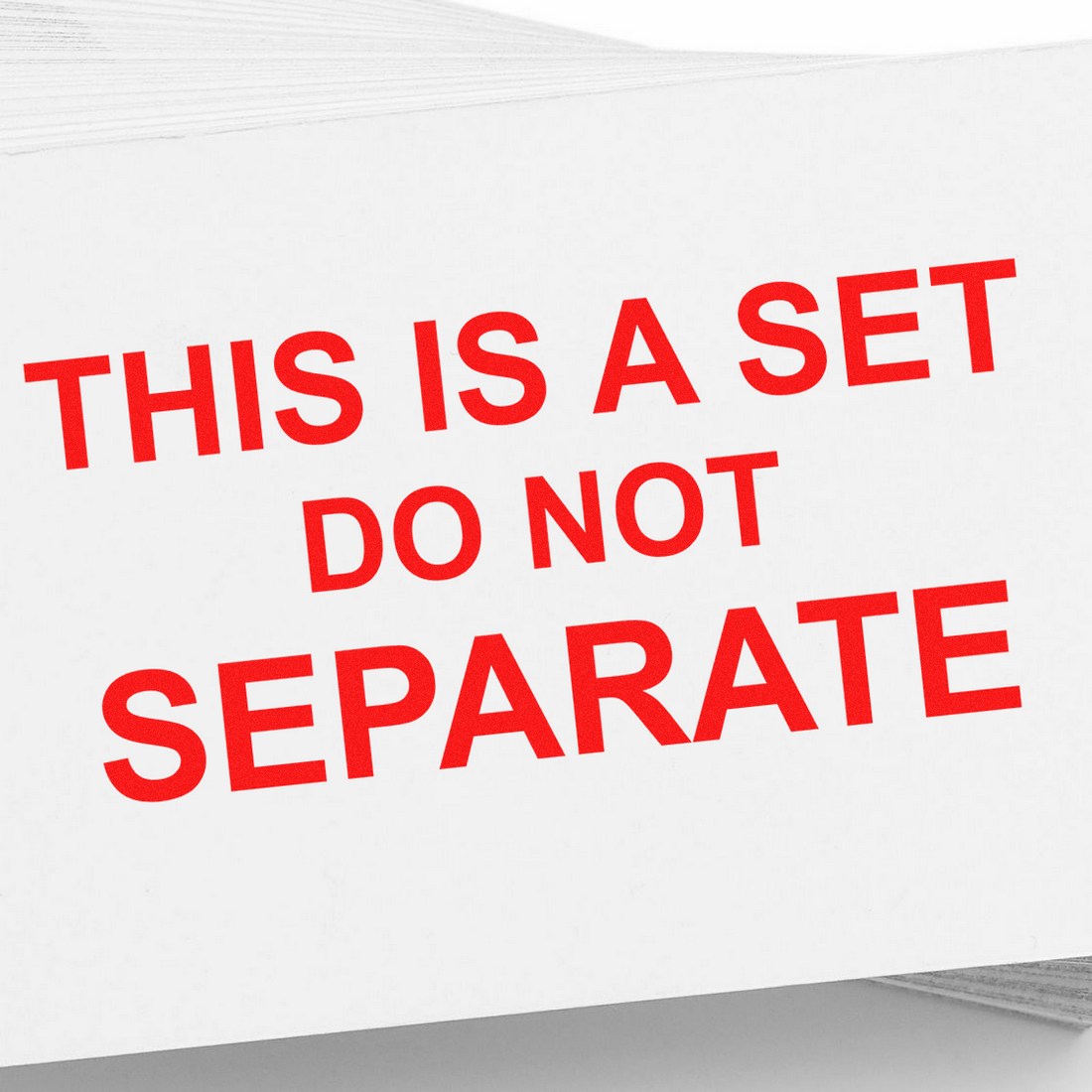 Image of a Self-Inking Do Not Separate Set Stamp with bold red text on a white background, ideal for packaging and shipping needs.