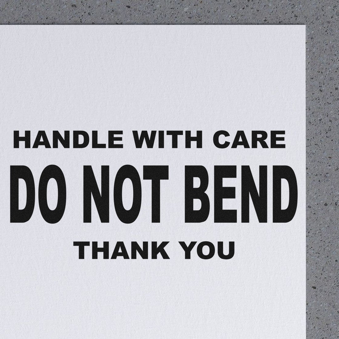 Wood Handle Handle With Care Do Not Bend Thank You Rubber Stamp on paper, featuring bold black text for packaging and shipping instructions.