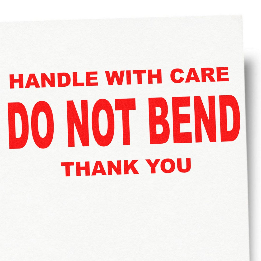 PSI Pre-Inked Handle With Care Do Not Bend Thank You Stamp in red text on white paper, emphasizing caution for fragile items.