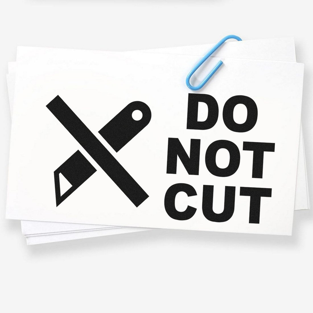 PSI Pre-Inked Do Not Cut Symbol Stamp featuring a crossed-out knife icon and bold 'Do Not Cut' text on a white background, ideal for clear, visible warnings on packages.