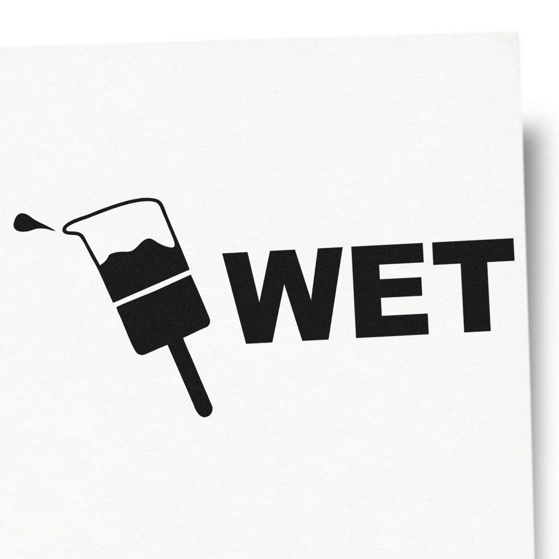 Wood Handle Wet Rubber Stamp imprint showing a paint roller with the word 'WET' on white paper, highlighting its bold, clear design for marking surfaces.