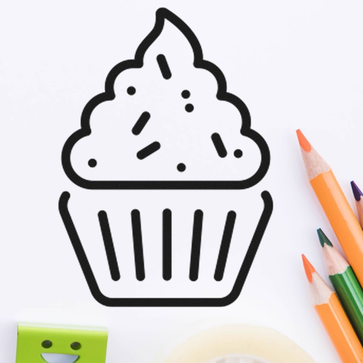 Self-Inking Happy Cupcakes Card Reward Stamp with a cupcake design, surrounded by colorful pencils and a smiling eraser, perfect for teachers and parents.