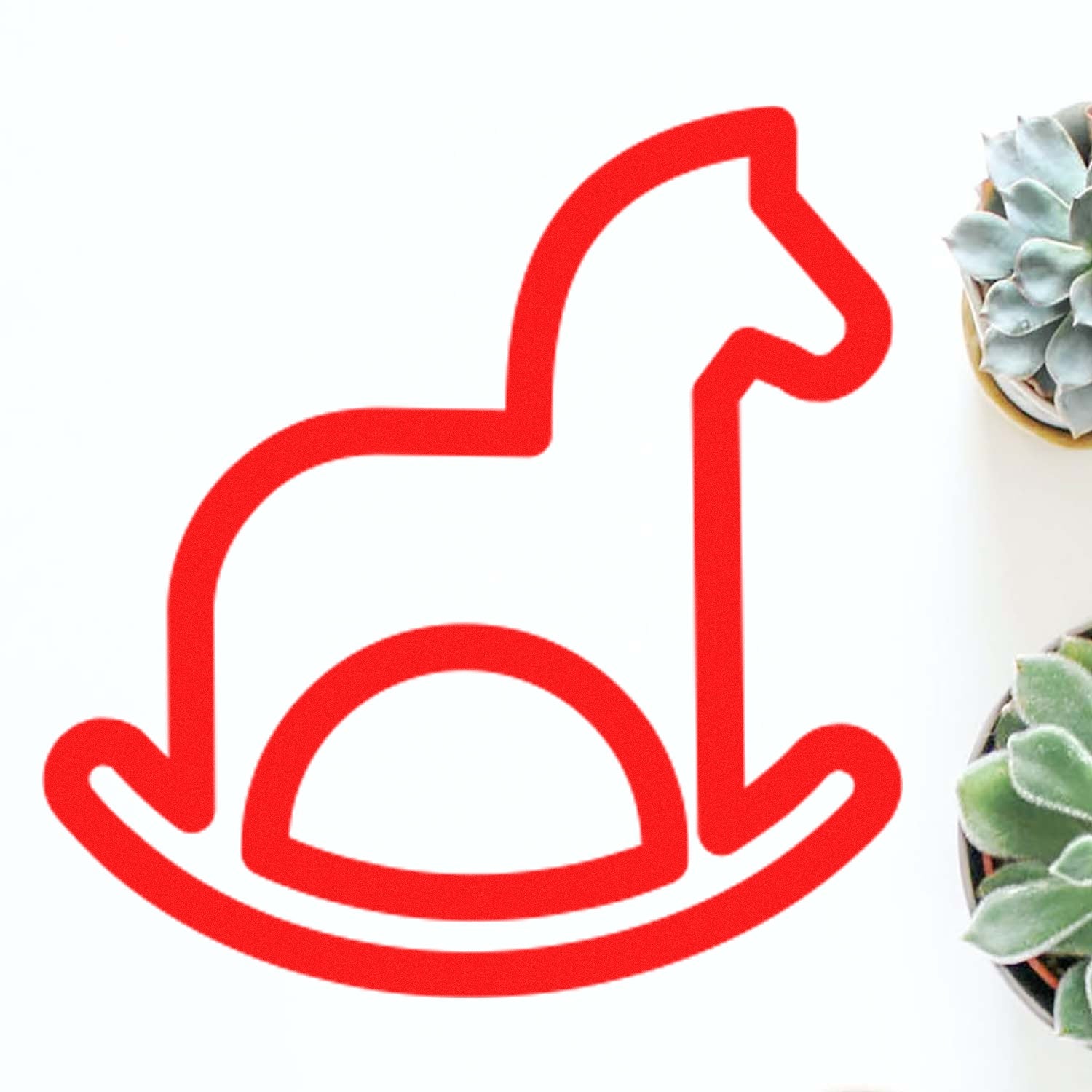 Self-Inking Rocking Horse Delight Loyalty Scheme Stamp in red, featuring a rocking horse design, surrounded by green succulents on a white background. Perfect for loyalty programs and crafts.