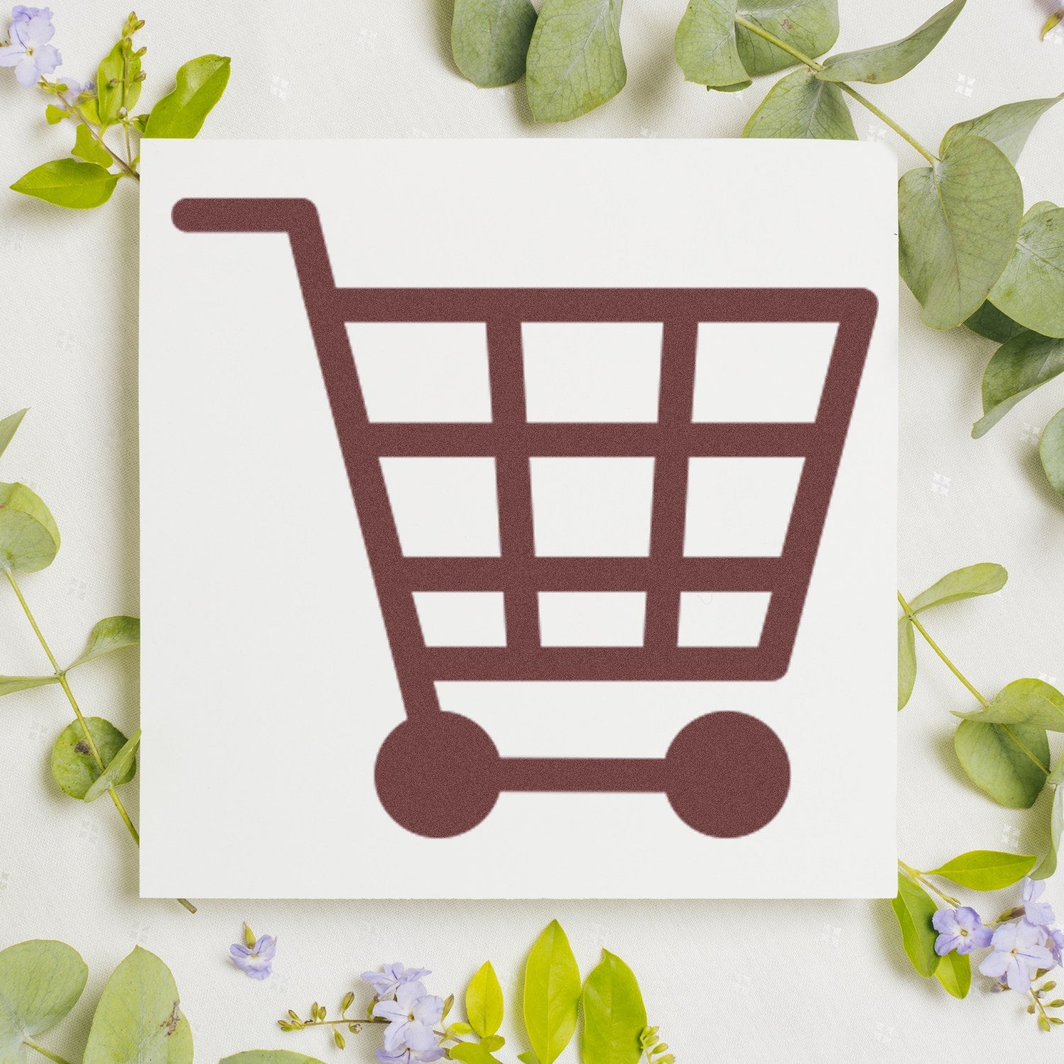 Wood Handle Shopper's Delight Discount Rubber Stamp featuring a shopping cart design, surrounded by green leaves and purple flowers on a light background. Perfect for crafting and retail use.