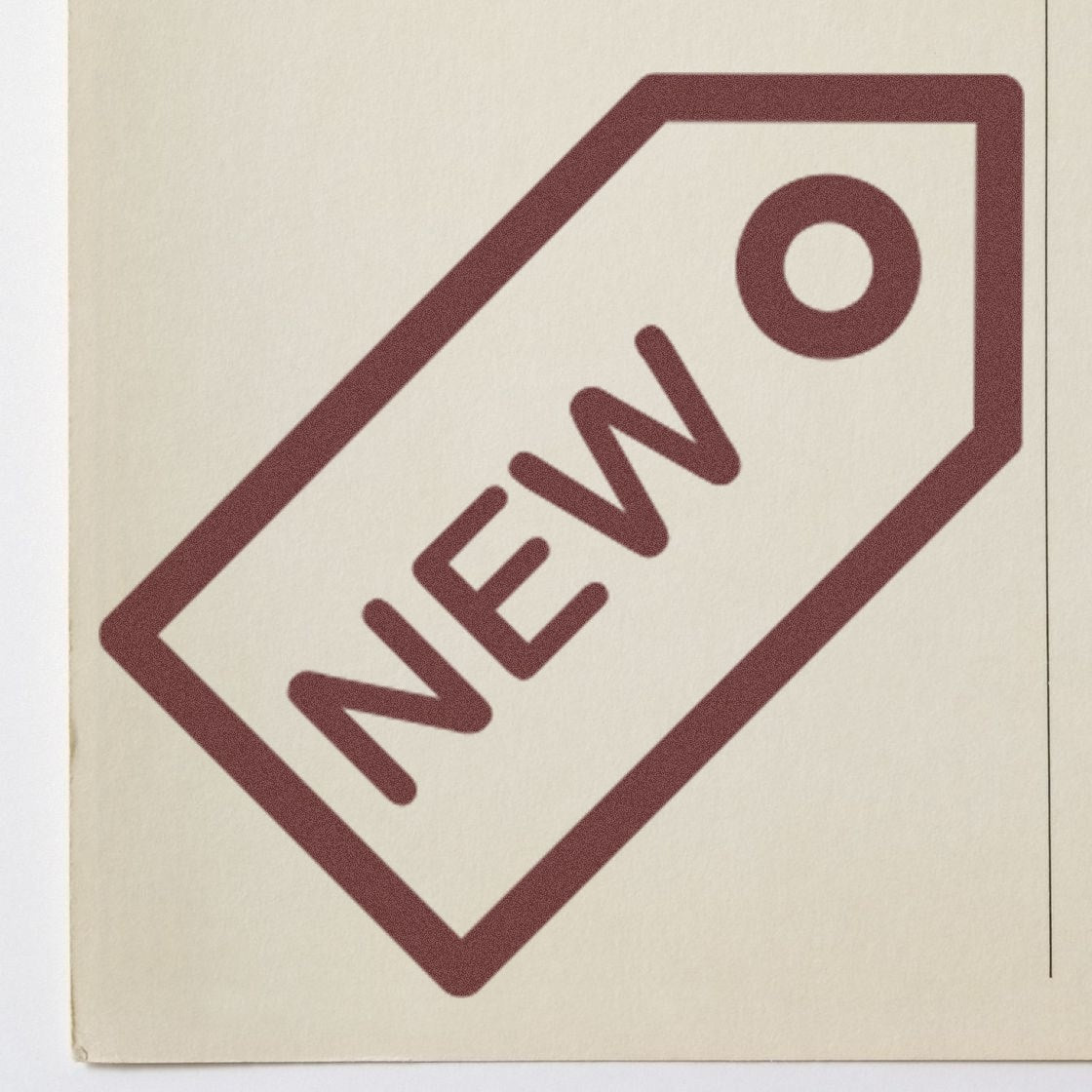 Self-Inking New Reward Stamp with a bold NEW design in brown ink on a beige background, perfect for teachers and businesses.