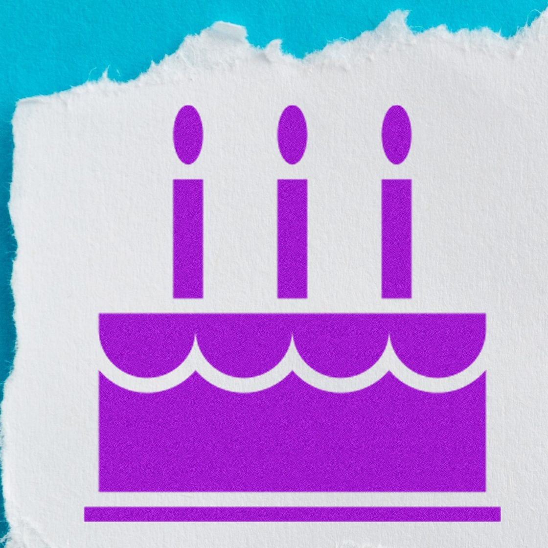 Wood Handle Cake Delight Incentive Rubber Stamp with purple cake design on torn white paper against a blue background.