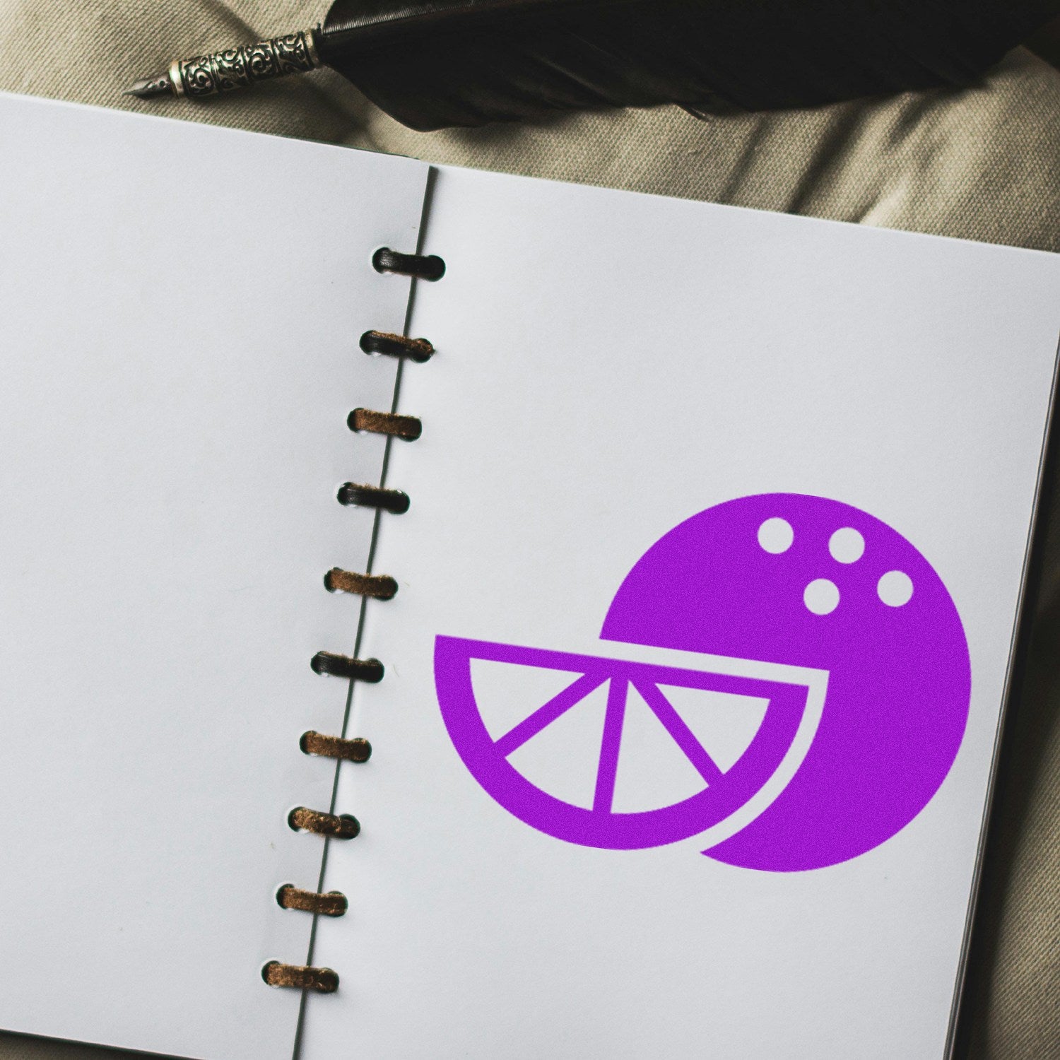 Wood Handle Fruity Fresh Customer Reward Rubber Stamp on open notebook, featuring a purple fruit design. Ideal for adding a playful touch to customer loyalty programs.