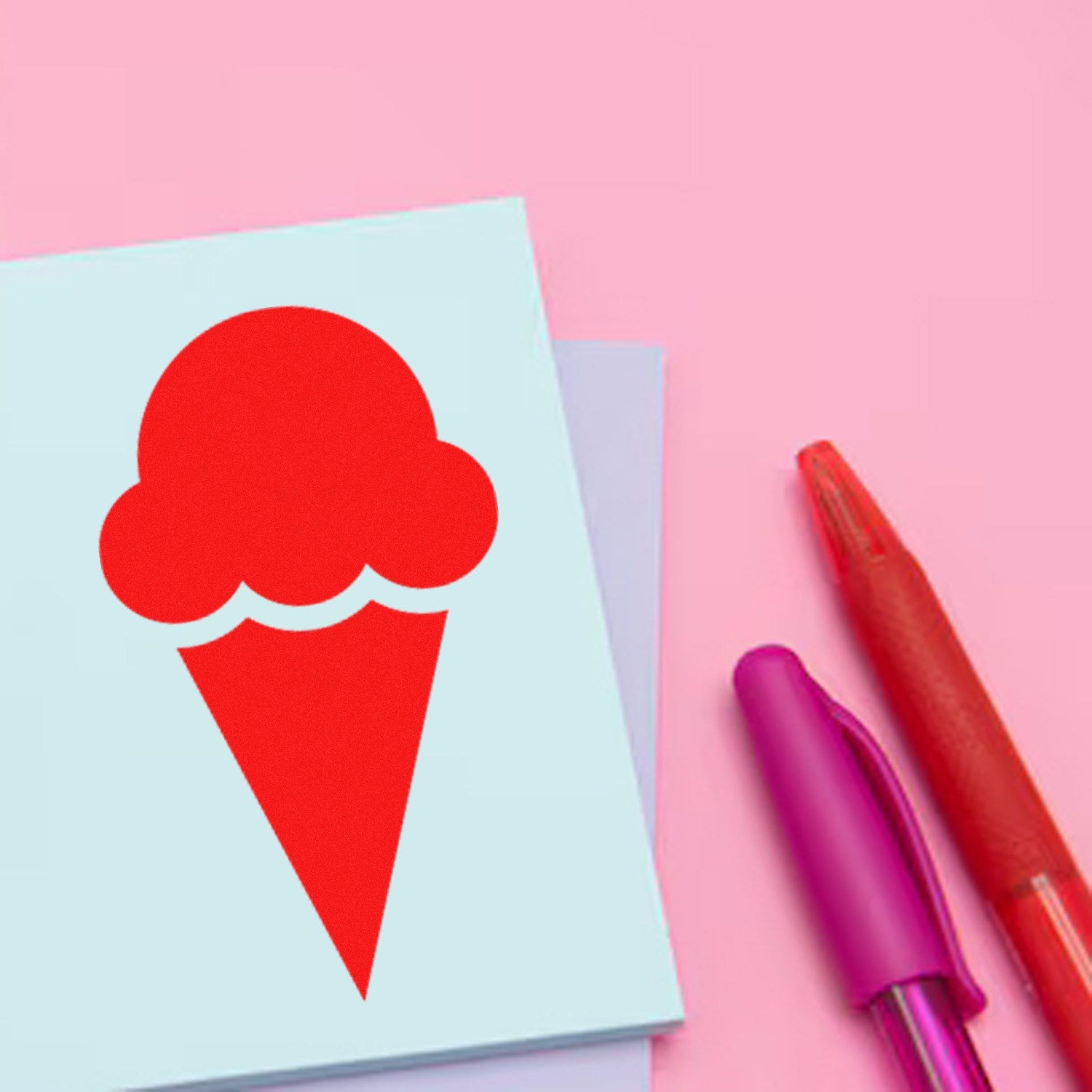 Wood Handle Ice Cream Delight Return Visit Rubber Stamp on pastel paper, featuring a red ice cream cone design. Perfect for adding a playful touch to stationery or crafts.