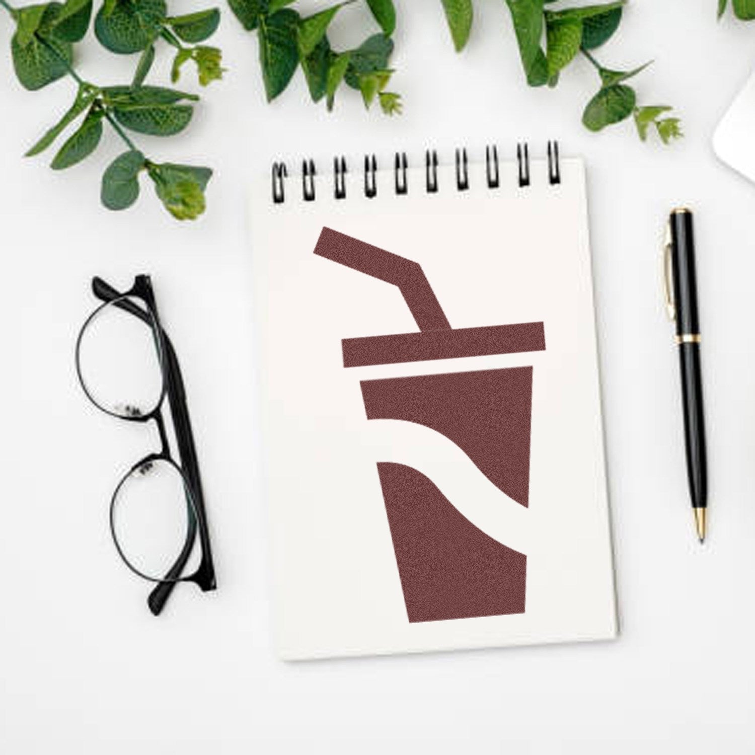 Self-Inking Cool Sip Collection for Rewards Stamp featuring a brown drink cup design with a straw, displayed on a notepad with glasses, pen, and green leaves.