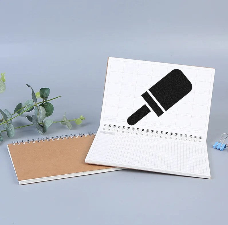 Self-Inking Pop Of Approval Visit Stamp on open notebook, showcasing bold popsicle design. Perfect for adding fun and approval to documents.