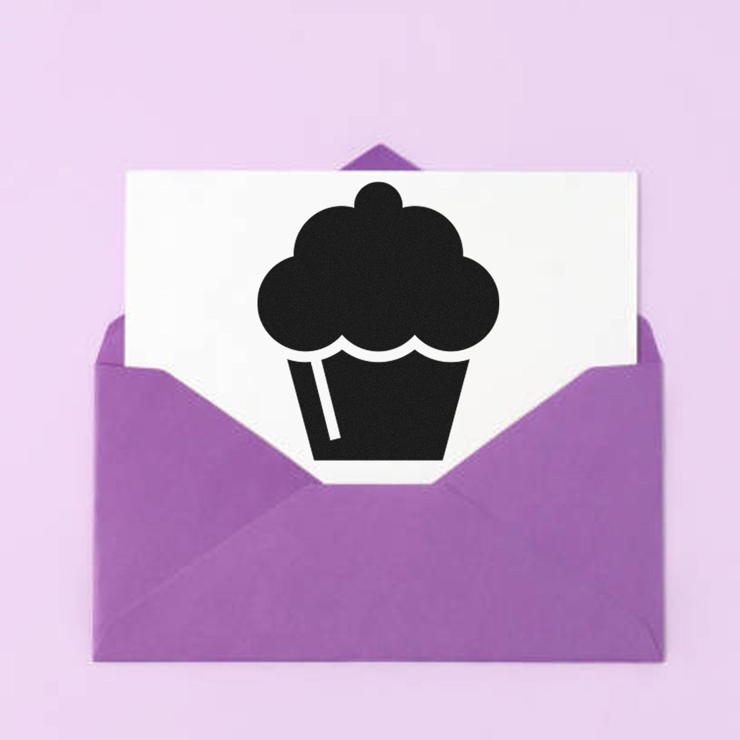 Wood Handle Cupcake Delight Loyalty Rubber Stamp on purple envelope, featuring a cupcake design. Perfect for adding a sweet touch to cards and crafts.