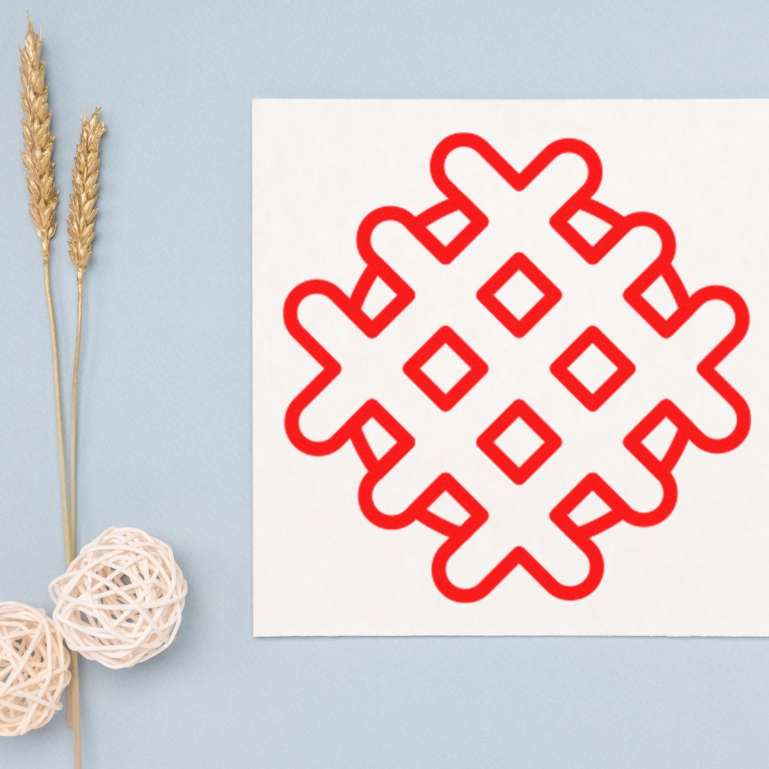 Wood Handle Wonderful Waffle Loyalty Points Rubber Stamp with a red waffle pattern on white paper, displayed on a light blue background with decorative elements.