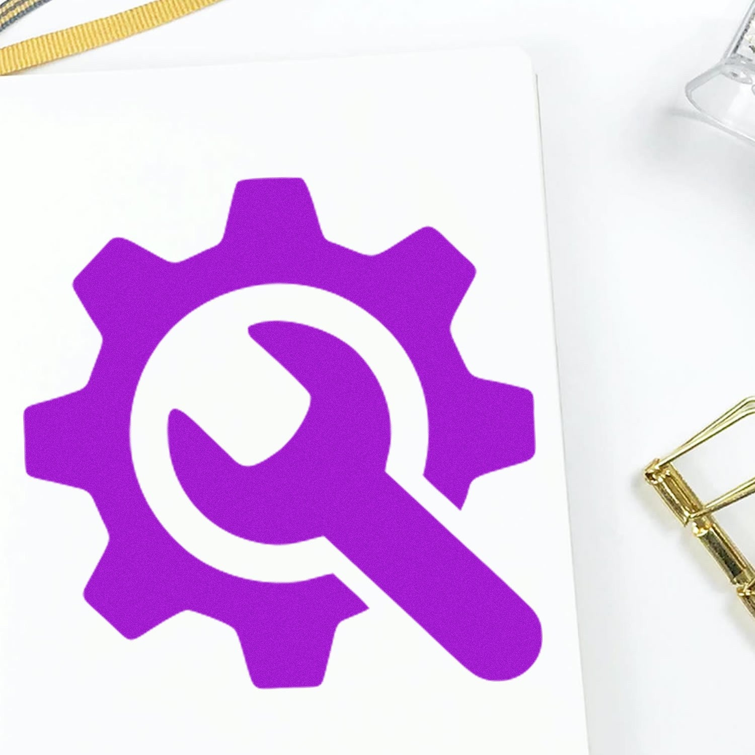 Purple Self-Inking Tool Reward Program Stamp on white paper, featuring a gear and wrench design, ideal for marking achievements and progress in programs.