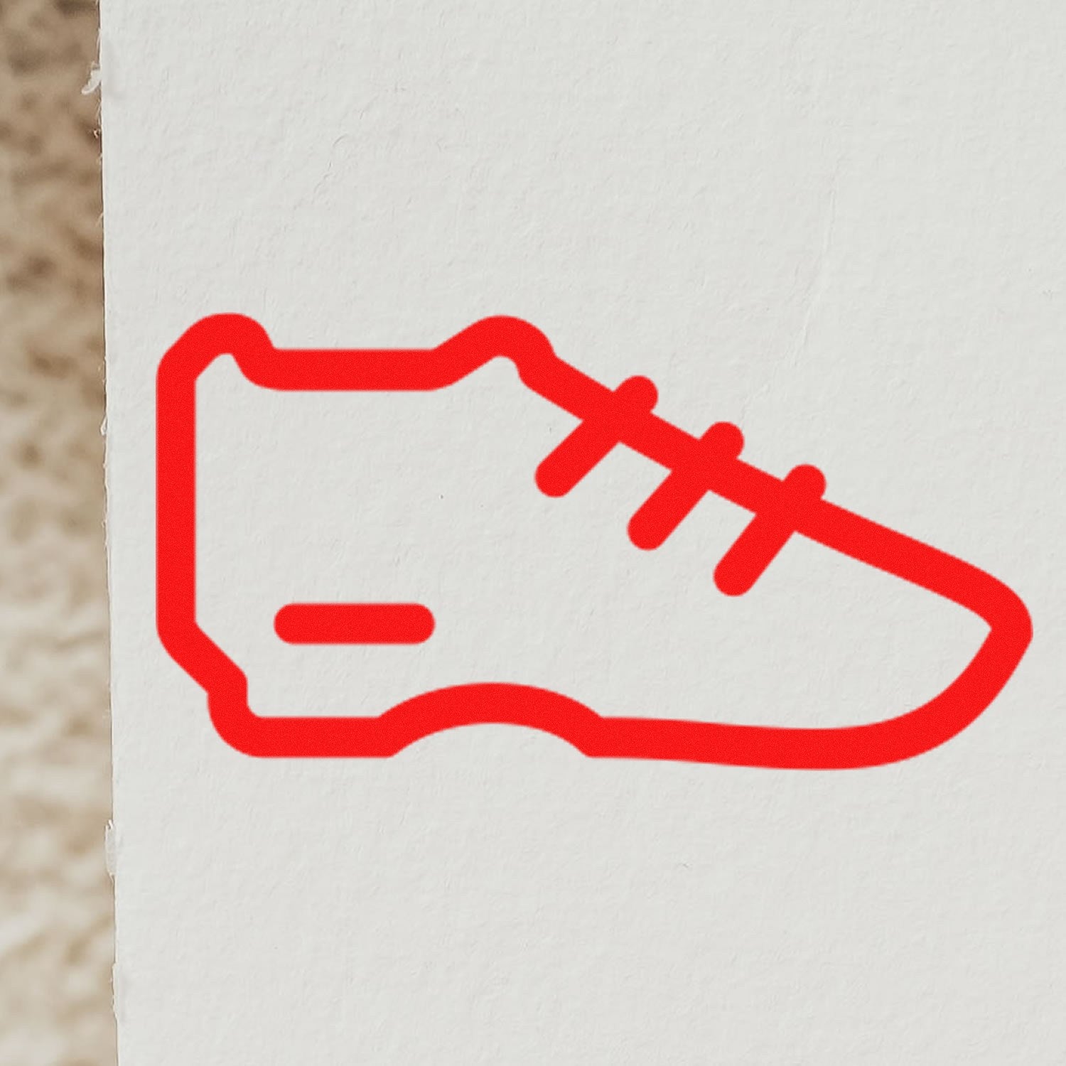 Wood Handle Sneaker Reward Rubber Stamp featuring a red sneaker outline on a white background, ideal for marking achievements or creative projects.