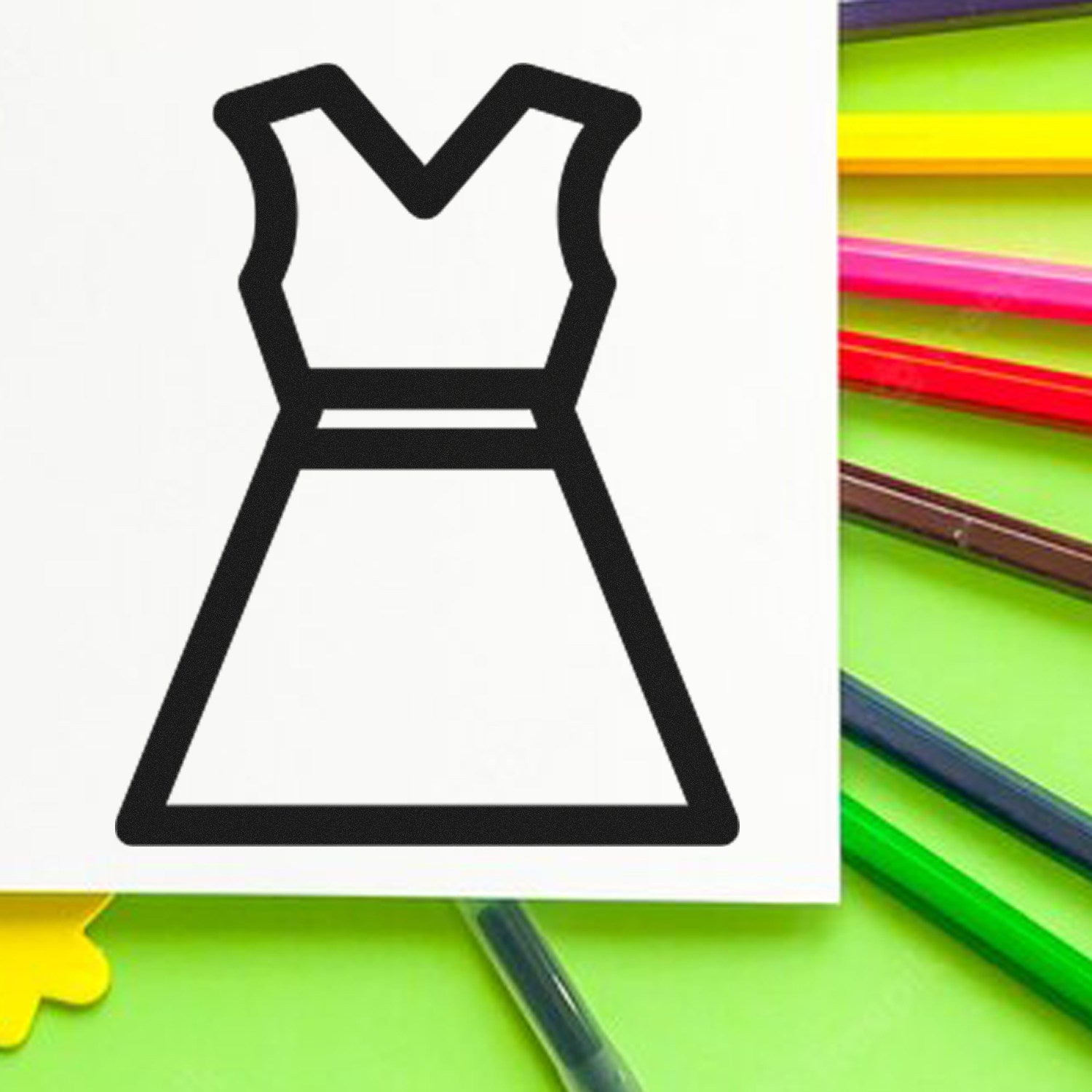 Self-Inking Clothing Punch Card Stamp with dress icon design, shown on a colorful background with markers. Ideal for labeling clothing efficiently.