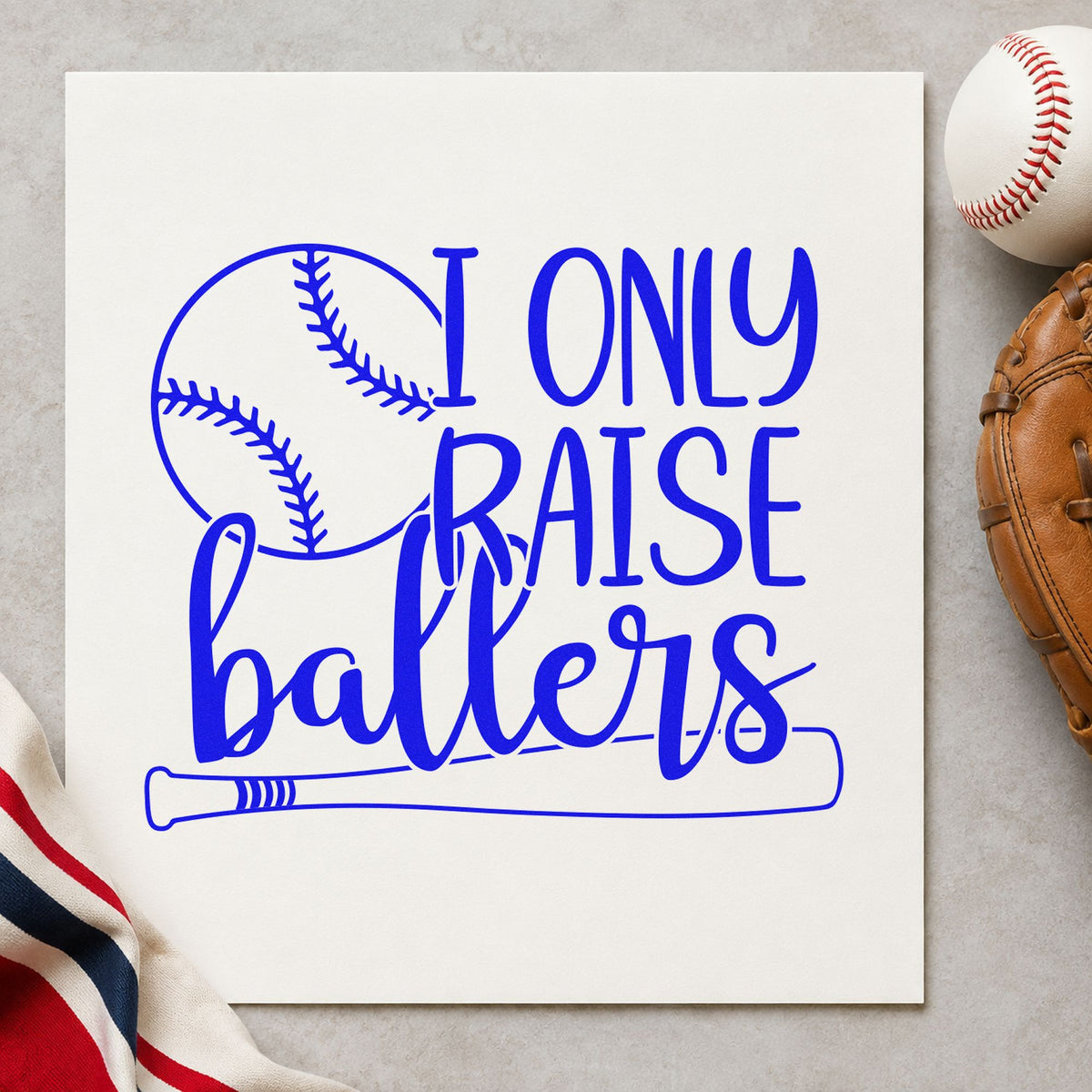 I Only Raise Ballers craft stamp in blue ink on cardstock, an easy option for game day tees.