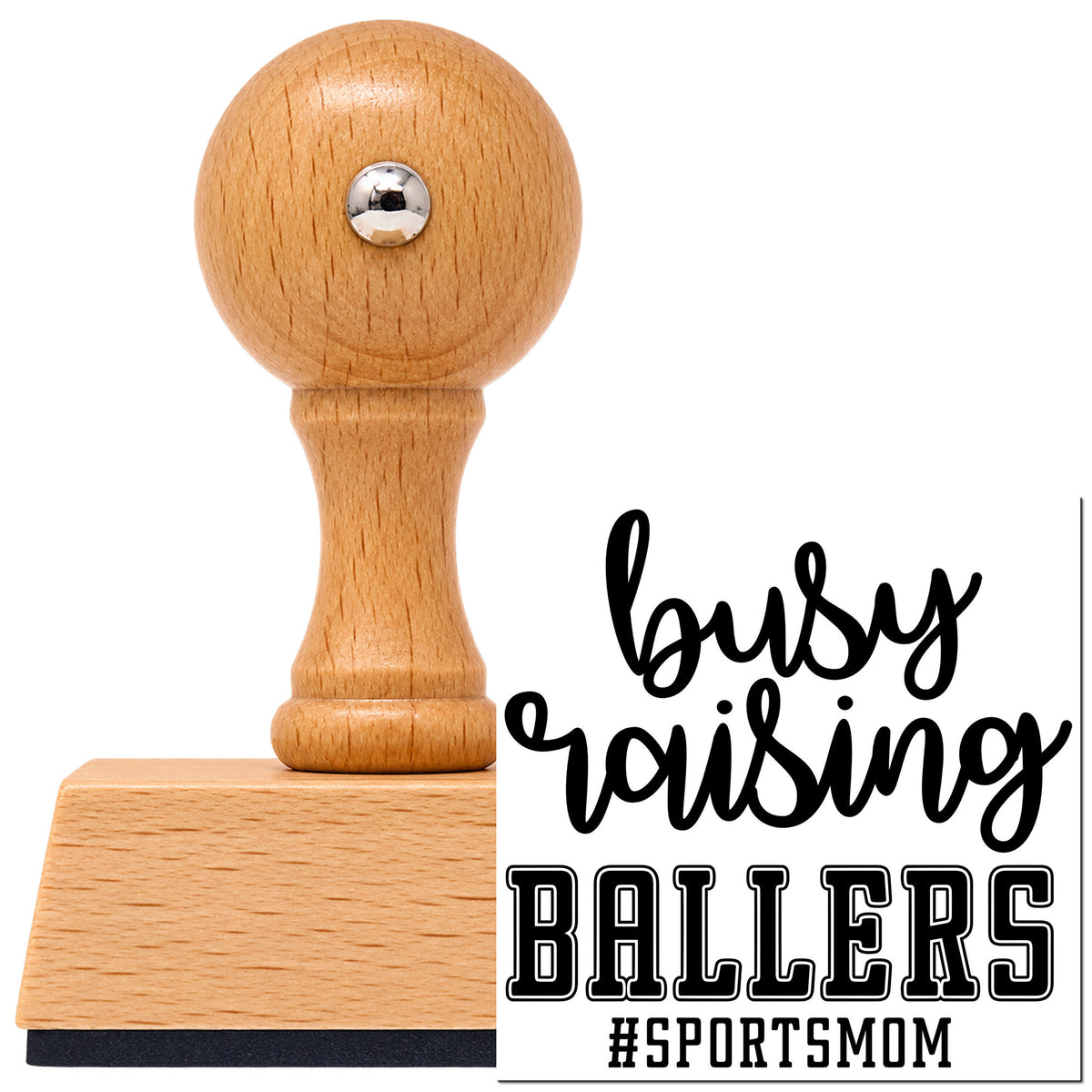 Vintage Pro beech wood stamp with a round knob handle, shown with its black Busy Raising Ballers imprint on white.