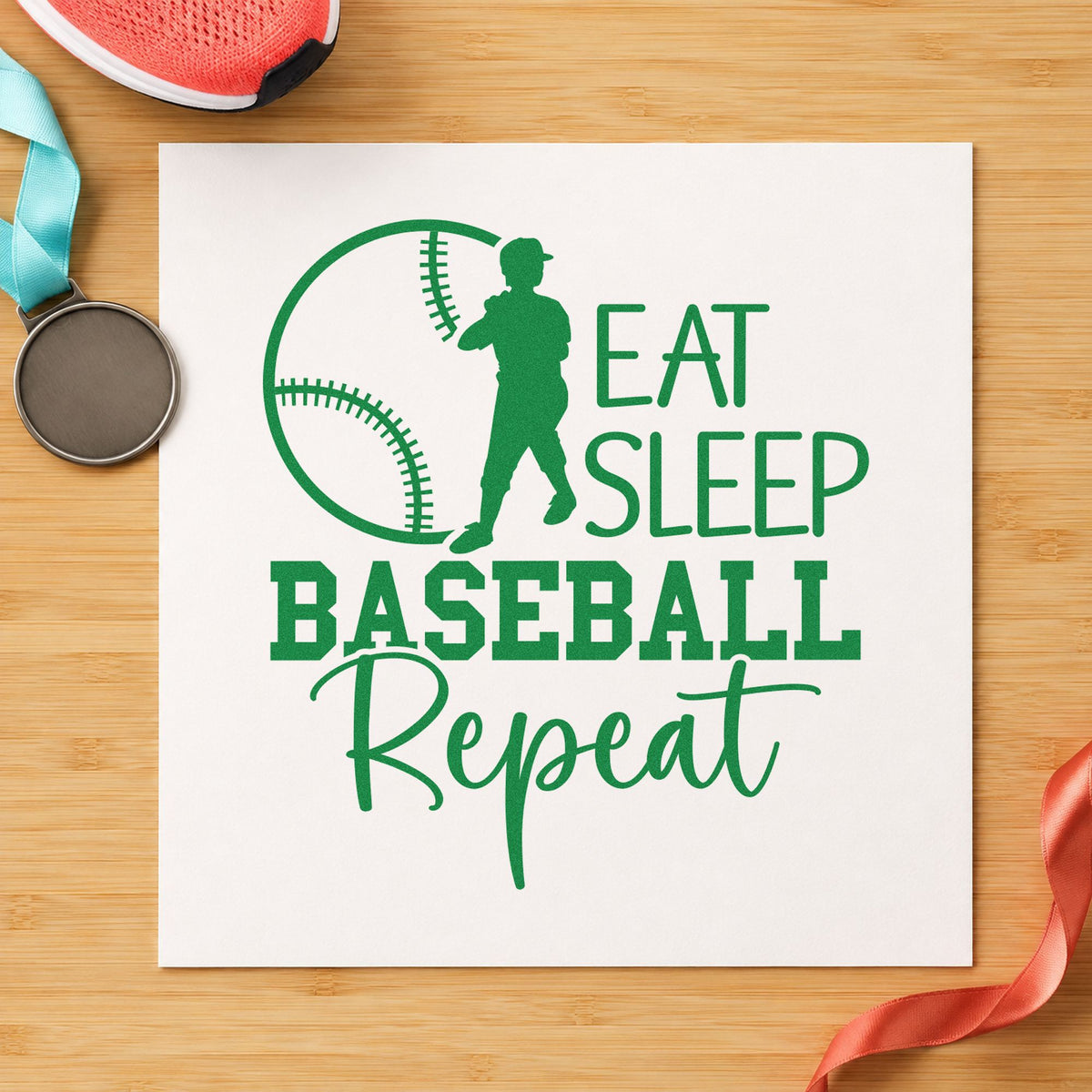 Eat Sleep Baseball Repeat craft stamp imprint in green ink on a handmade project, one idea being room decor frames.