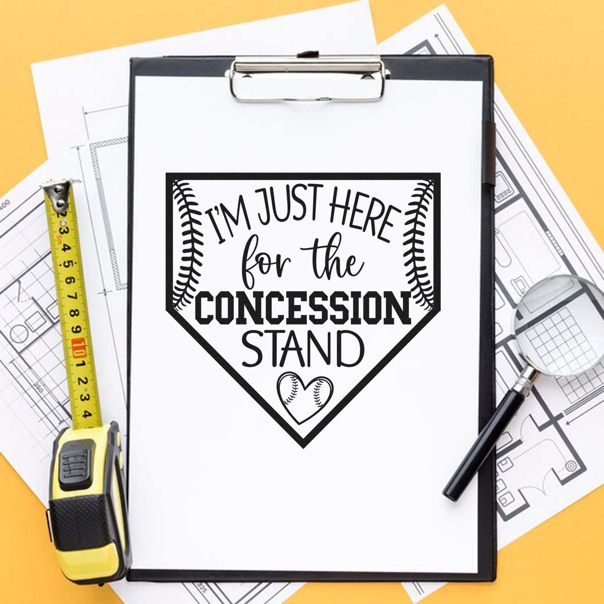 Black baseball concession stand stamp and seal design on clipboard, with measuring tape and blueprints over yellow background.