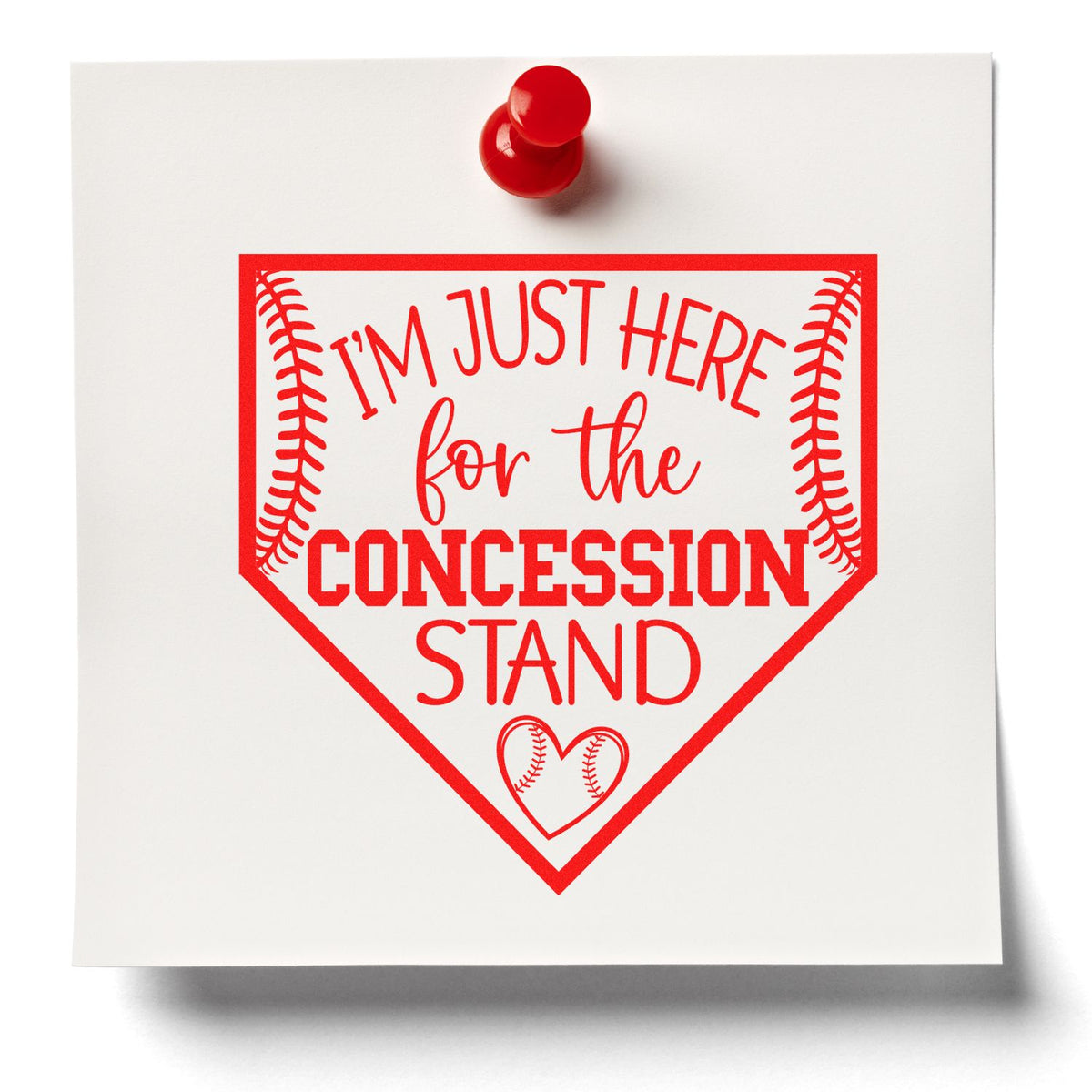 Red baseball-themed rubber stamp seal on white card reading Im just here for the concession stand, with red pushpin.